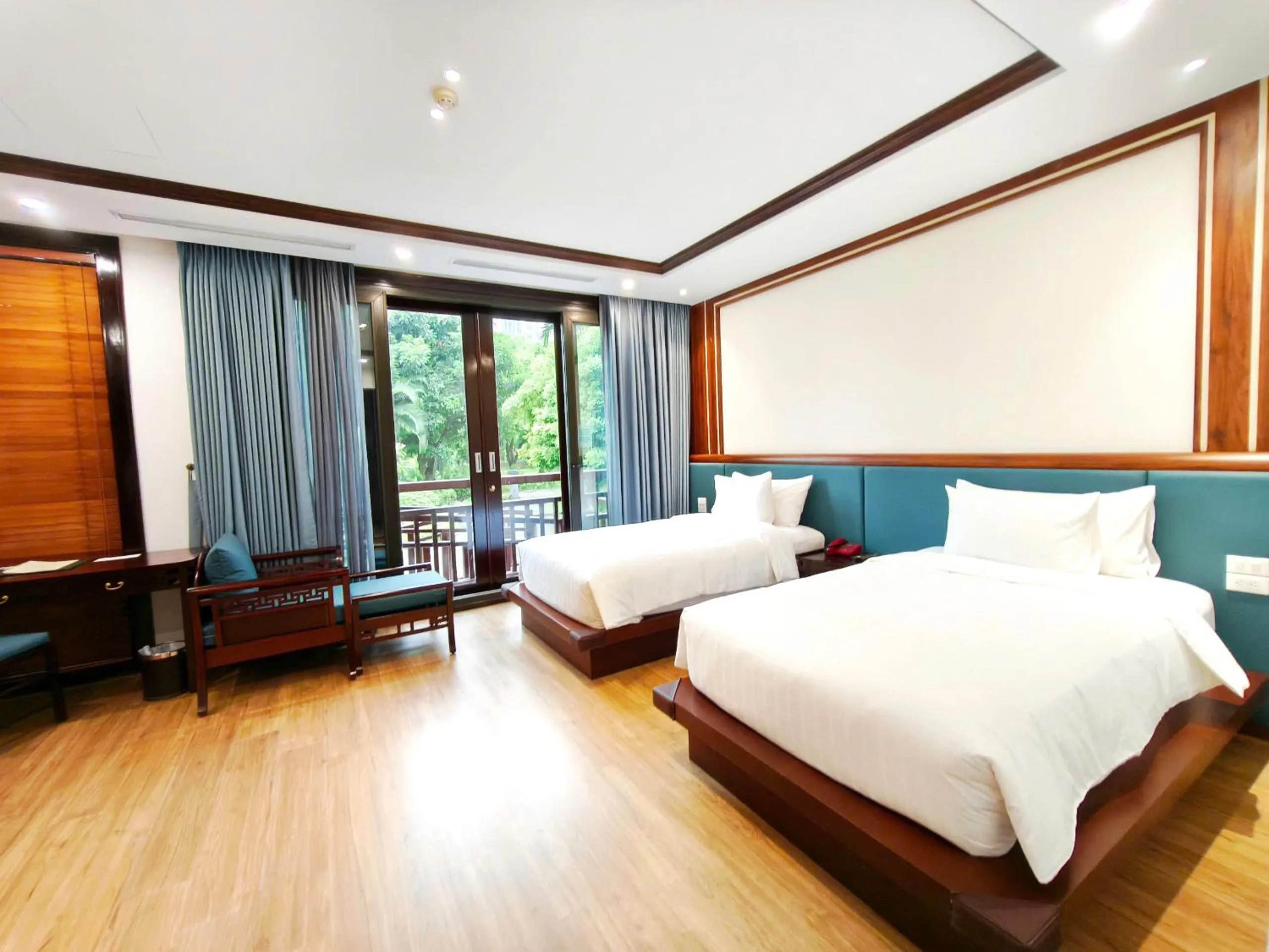 Bed in NCC Garden Villas - NCC Hotel