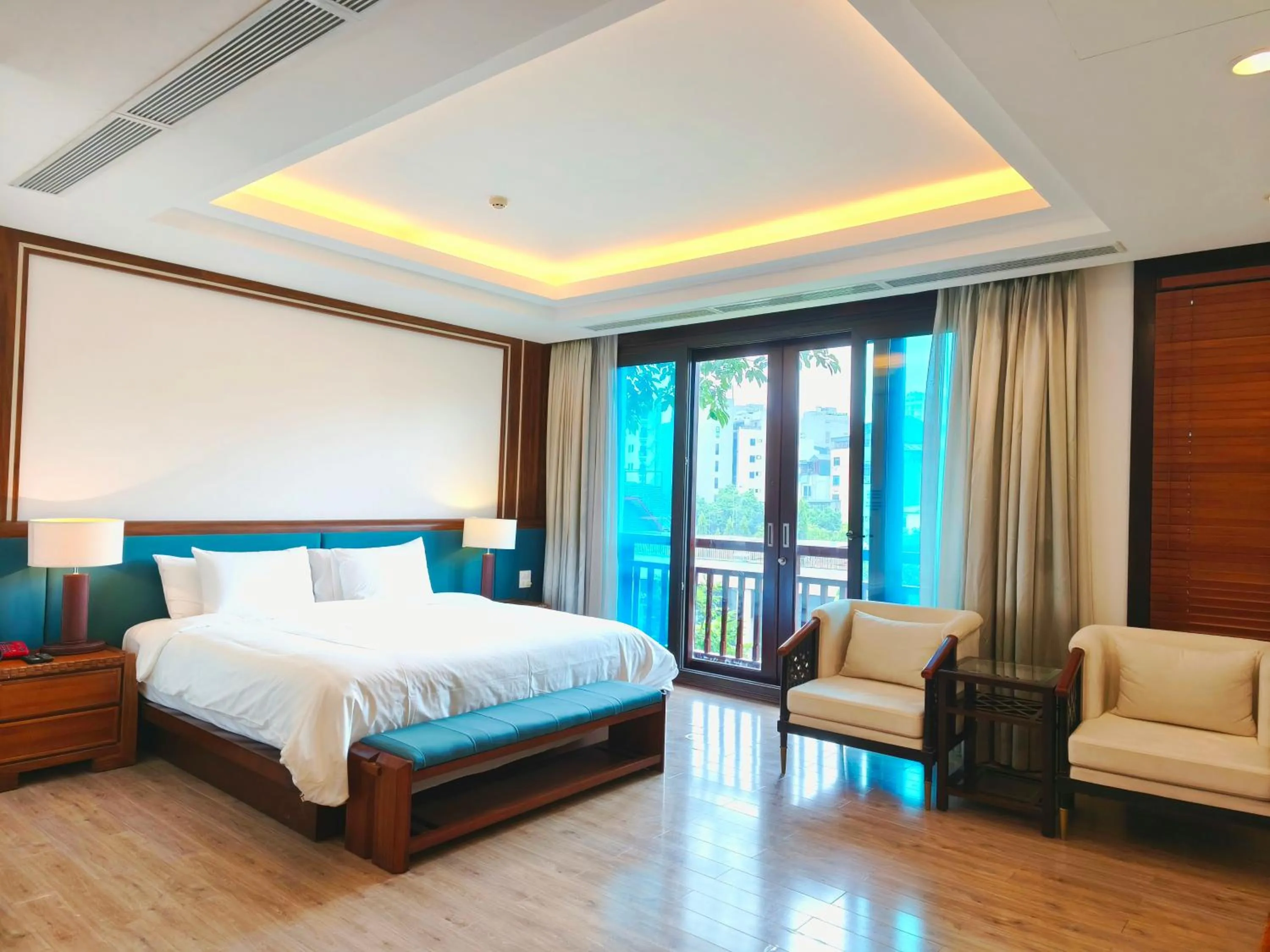 Bed in NCC Garden Villas - NCC Hotel