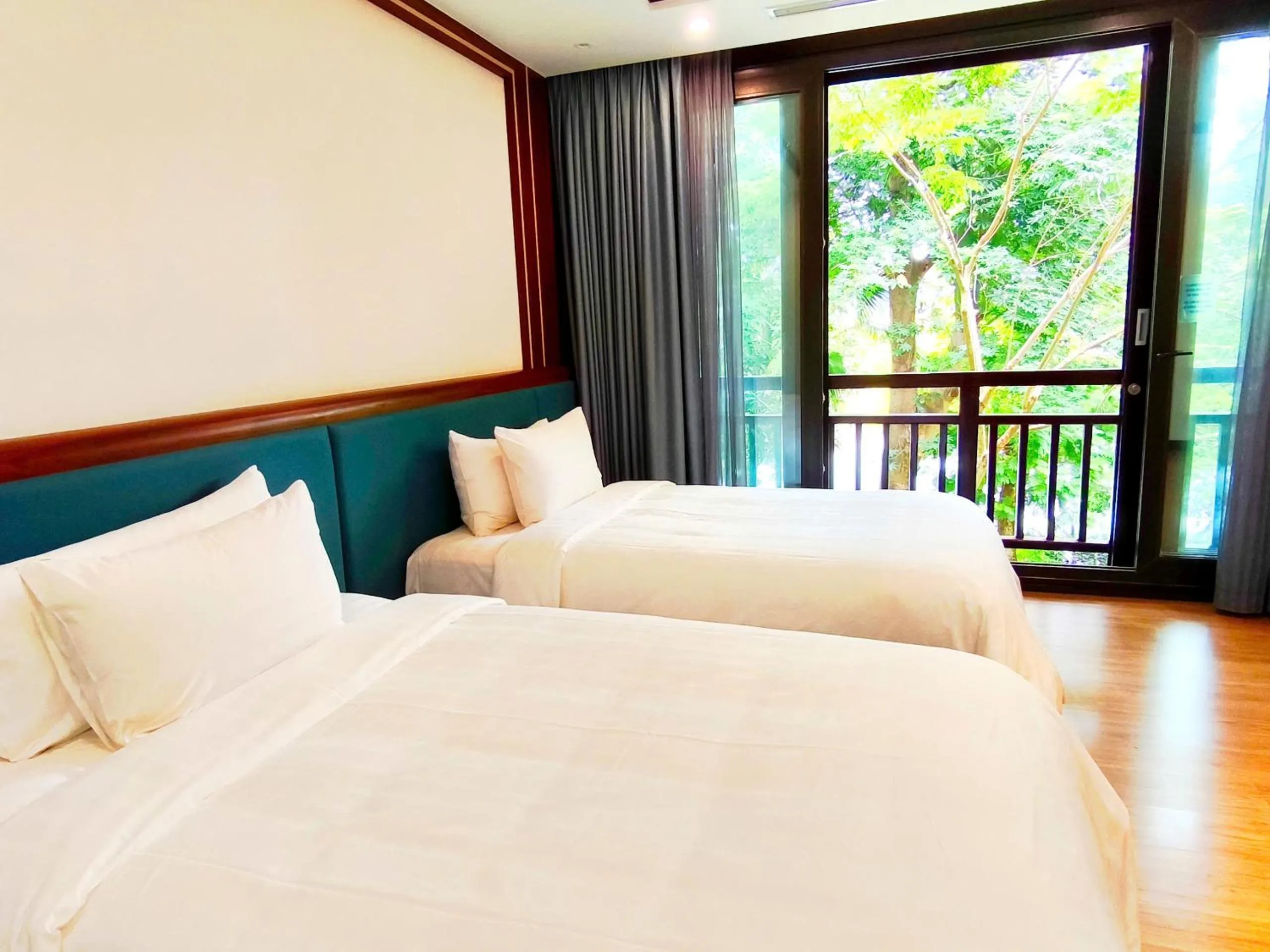 Bed in NCC Garden Villas - NCC Hotel