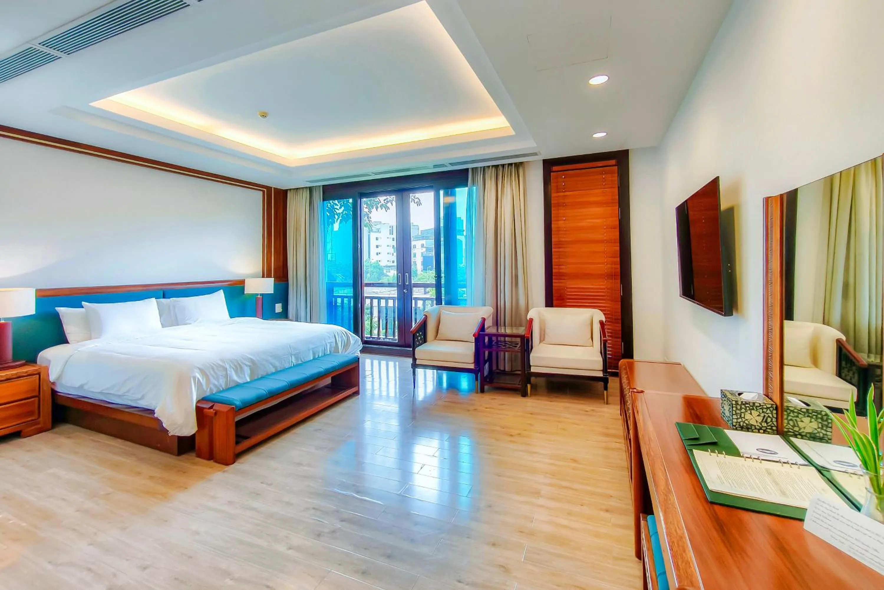 Bed in NCC Garden Villas - NCC Hotel