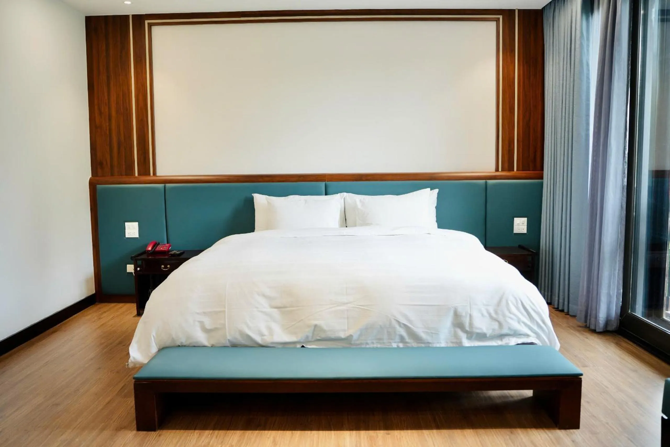 Bed in NCC Garden Villas - NCC Hotel