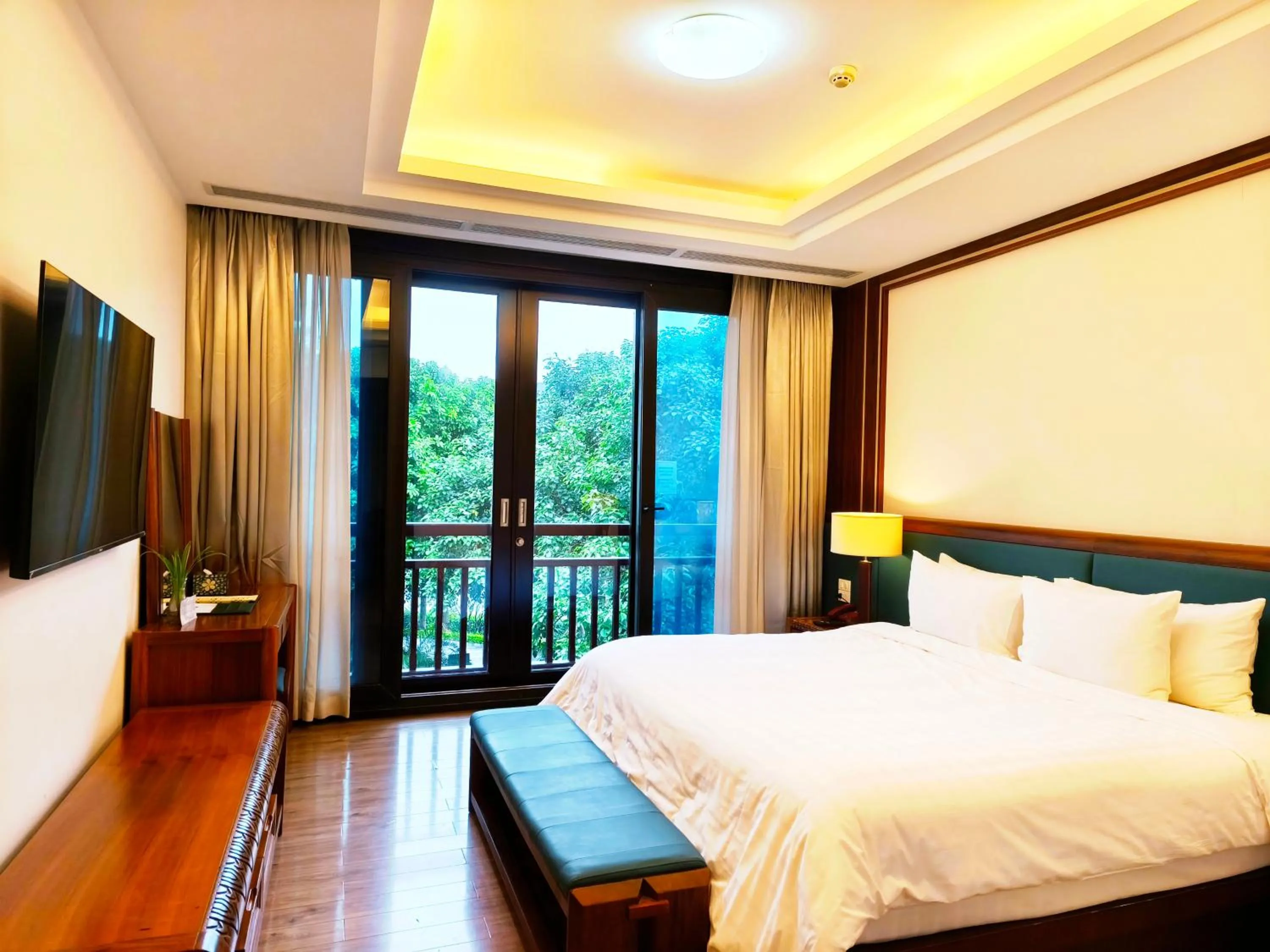 Bed in NCC Garden Villas - NCC Hotel