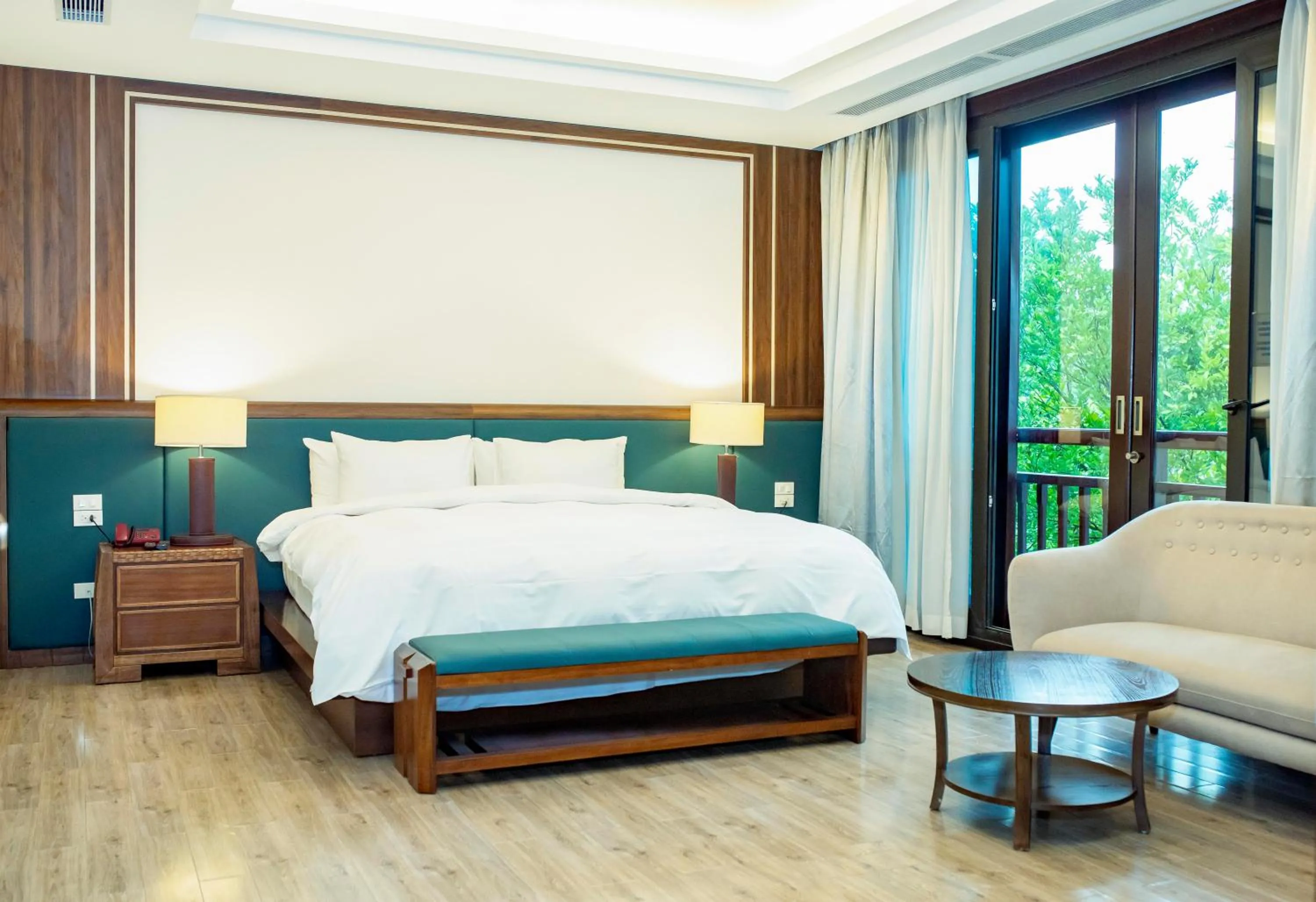 Bed in NCC Garden Villas - NCC Hotel