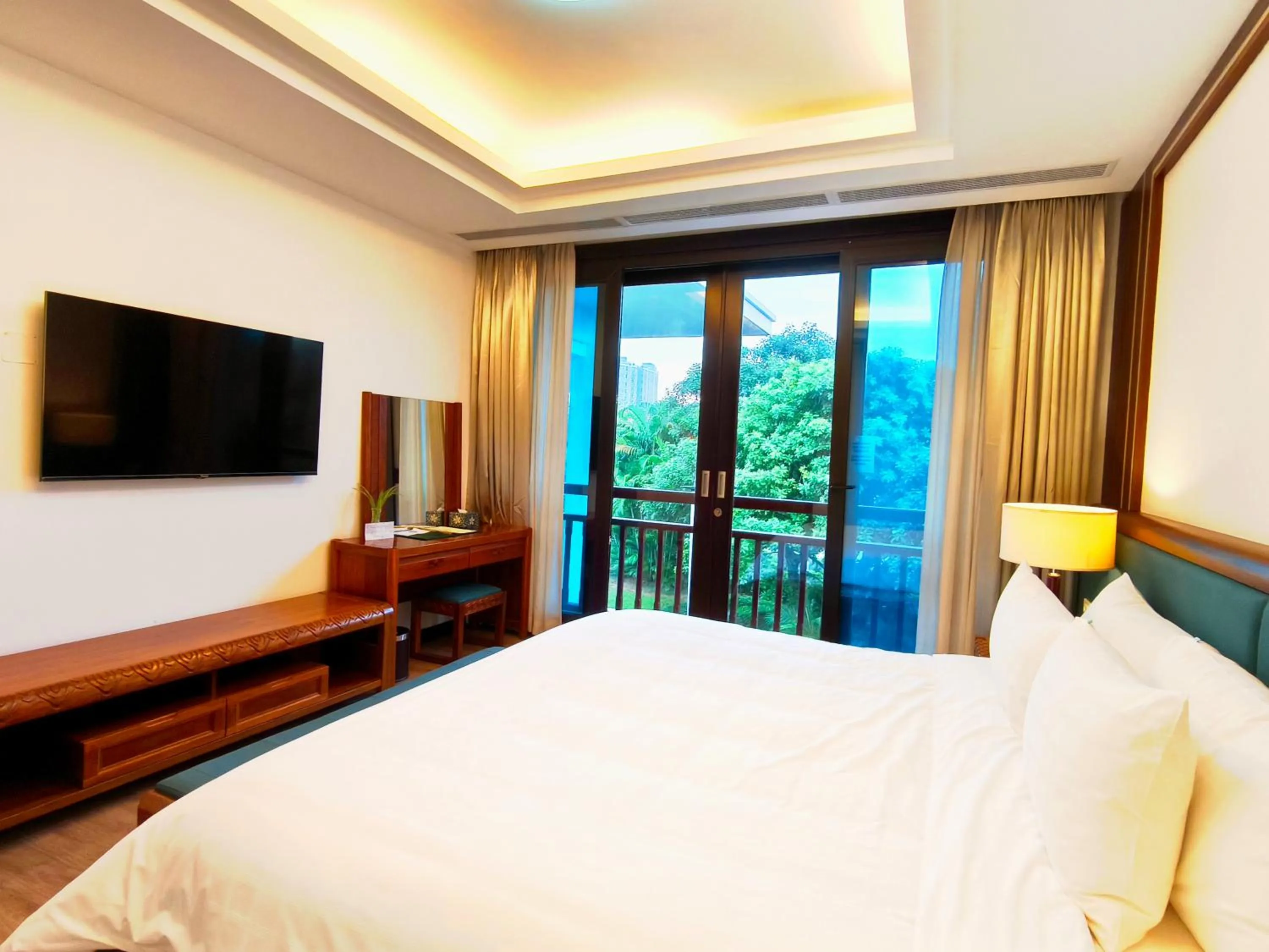 Bed in NCC Garden Villas - NCC Hotel