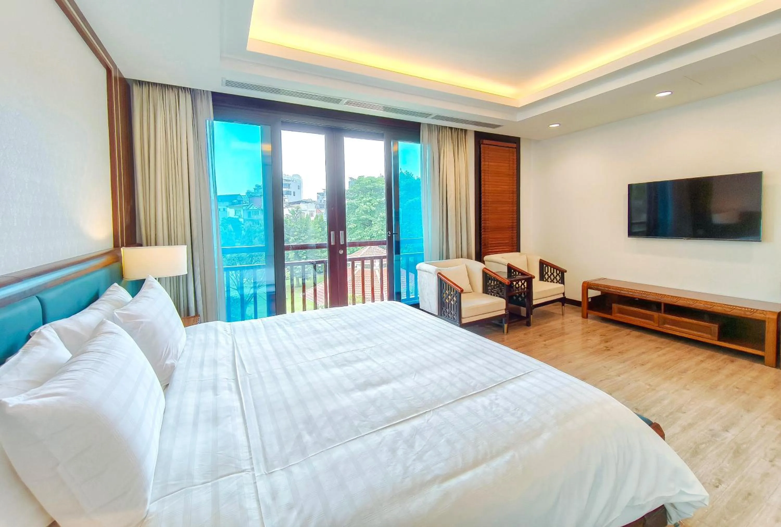 Bed in NCC Garden Villas - NCC Hotel