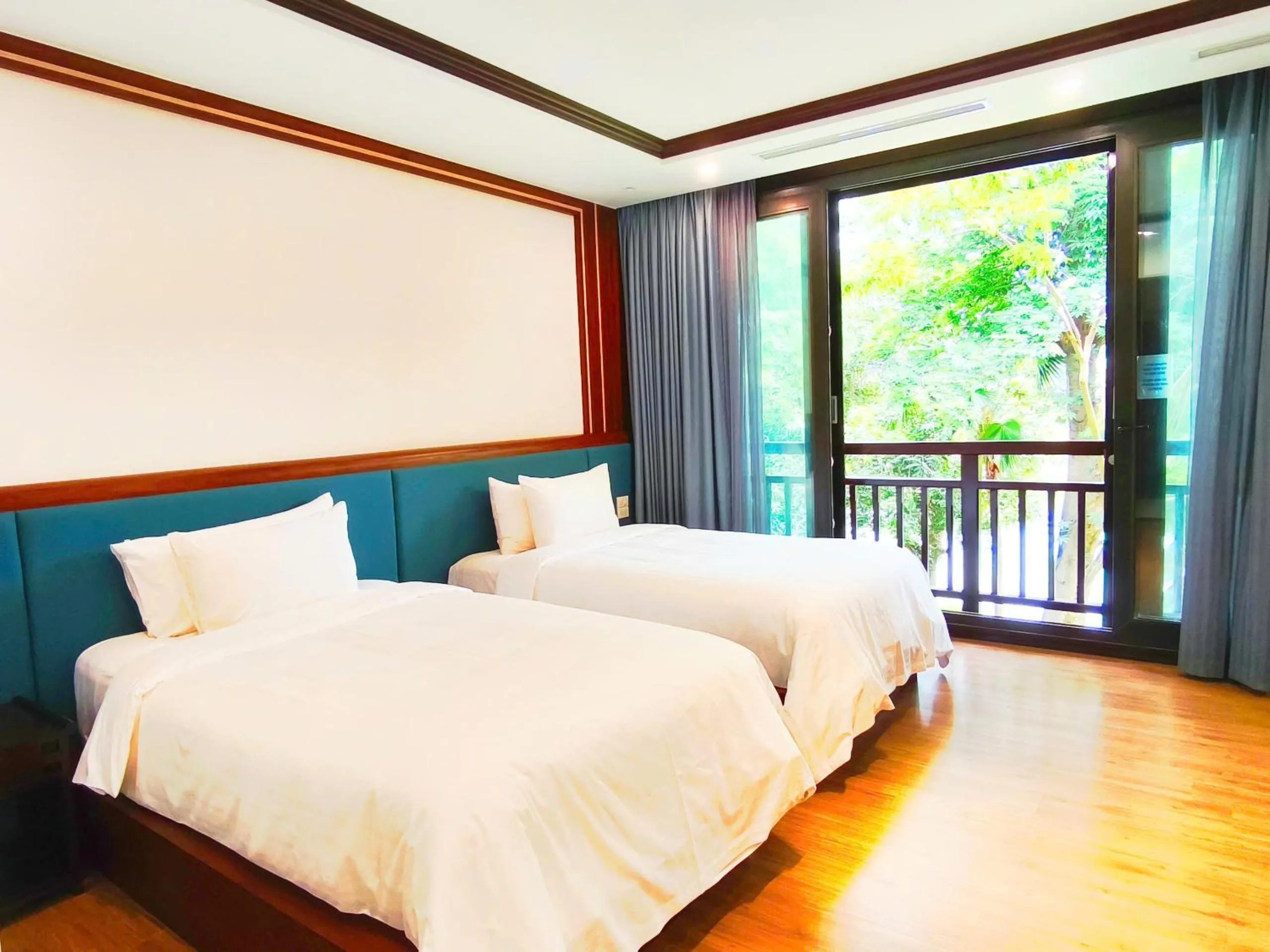 Bed in NCC Garden Villas - NCC Hotel