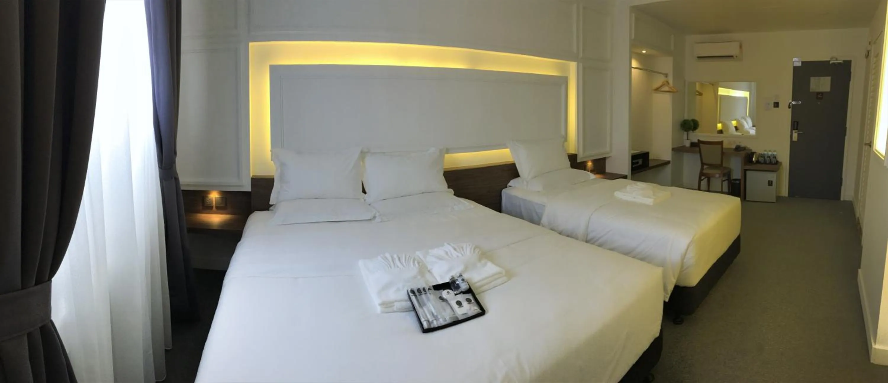 Bed in TheBlanc Boutique Hotel