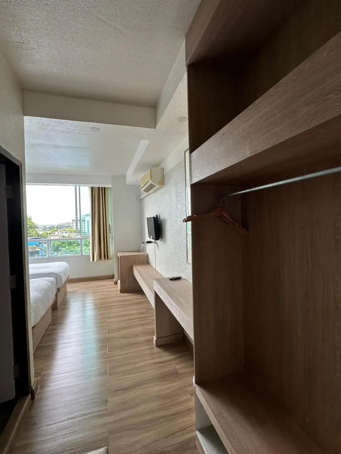 Bed in KM Kwanphayao Hotel Bed in KM Kwanphayao Hotel