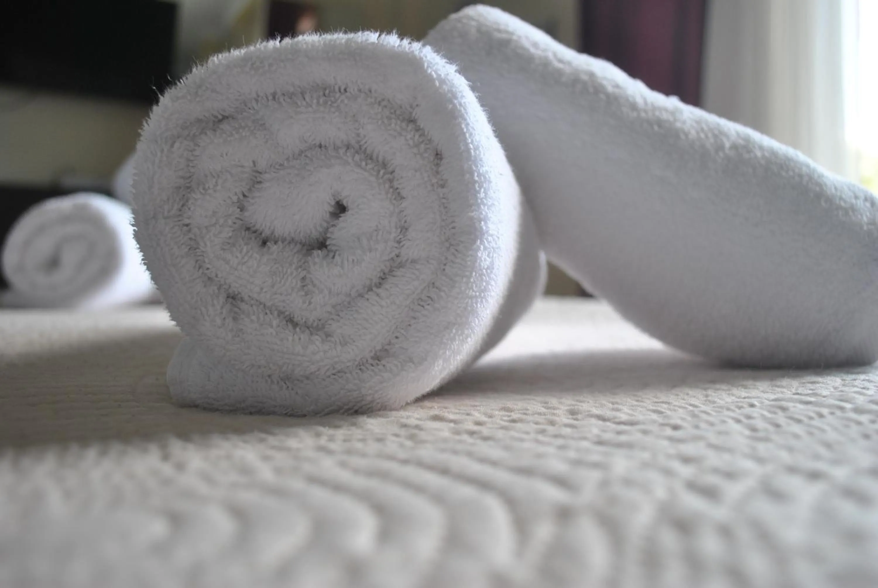 towels, Bed in Alexander Apartments