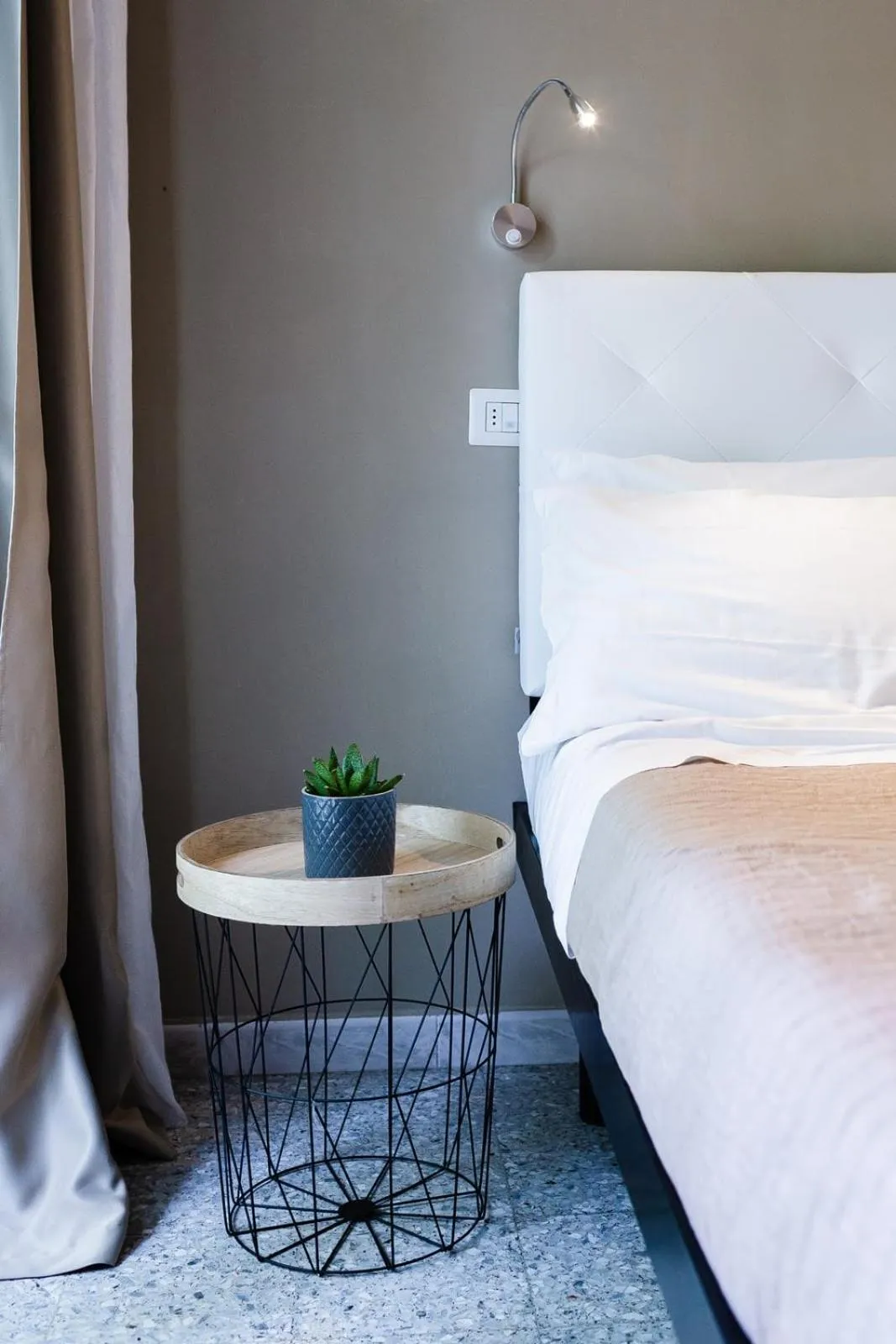 Bed in De La Ville Hotel