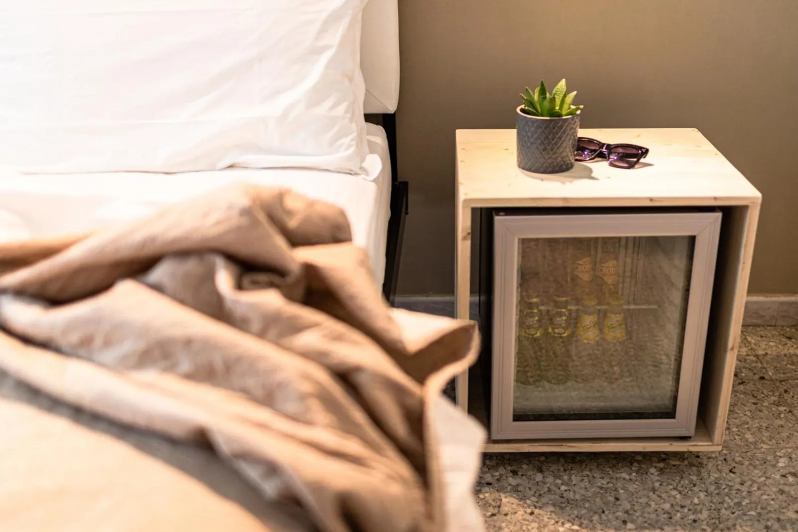 Bed in De La Ville Hotel