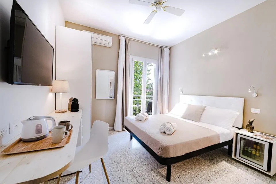 Bed in De La Ville Hotel