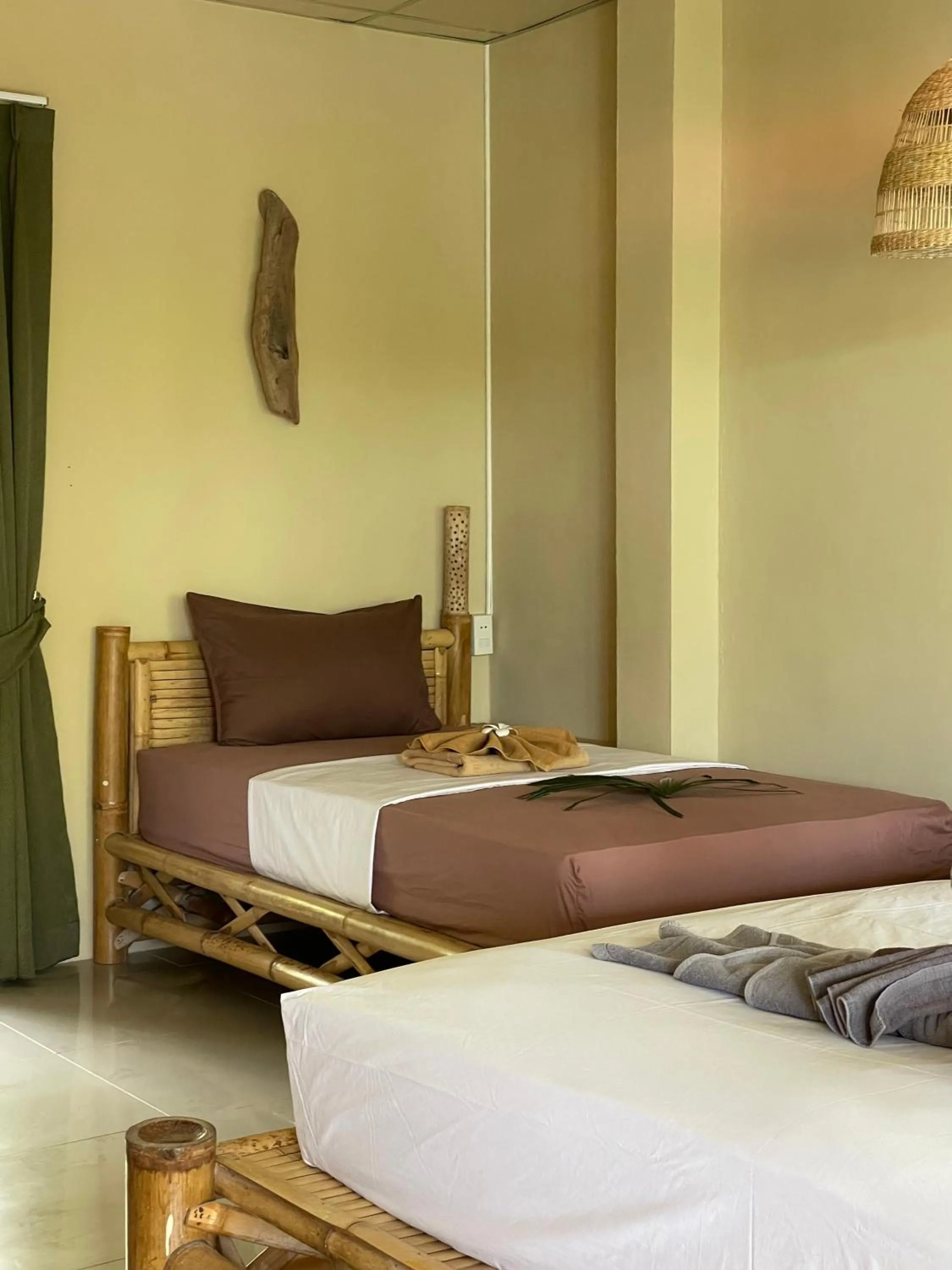 Bed in Mythai Guesthouse