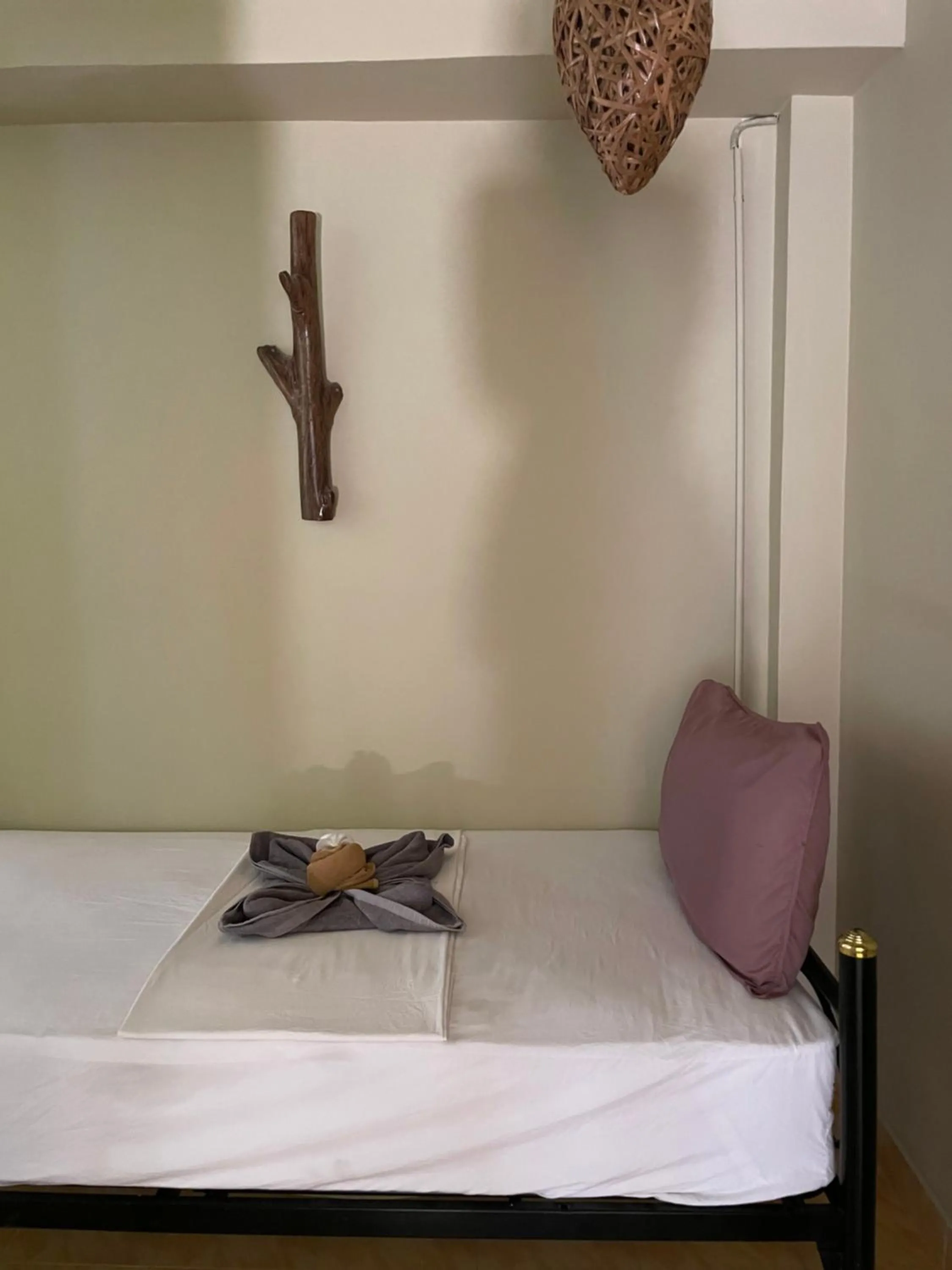 Bed in Mythai Guesthouse