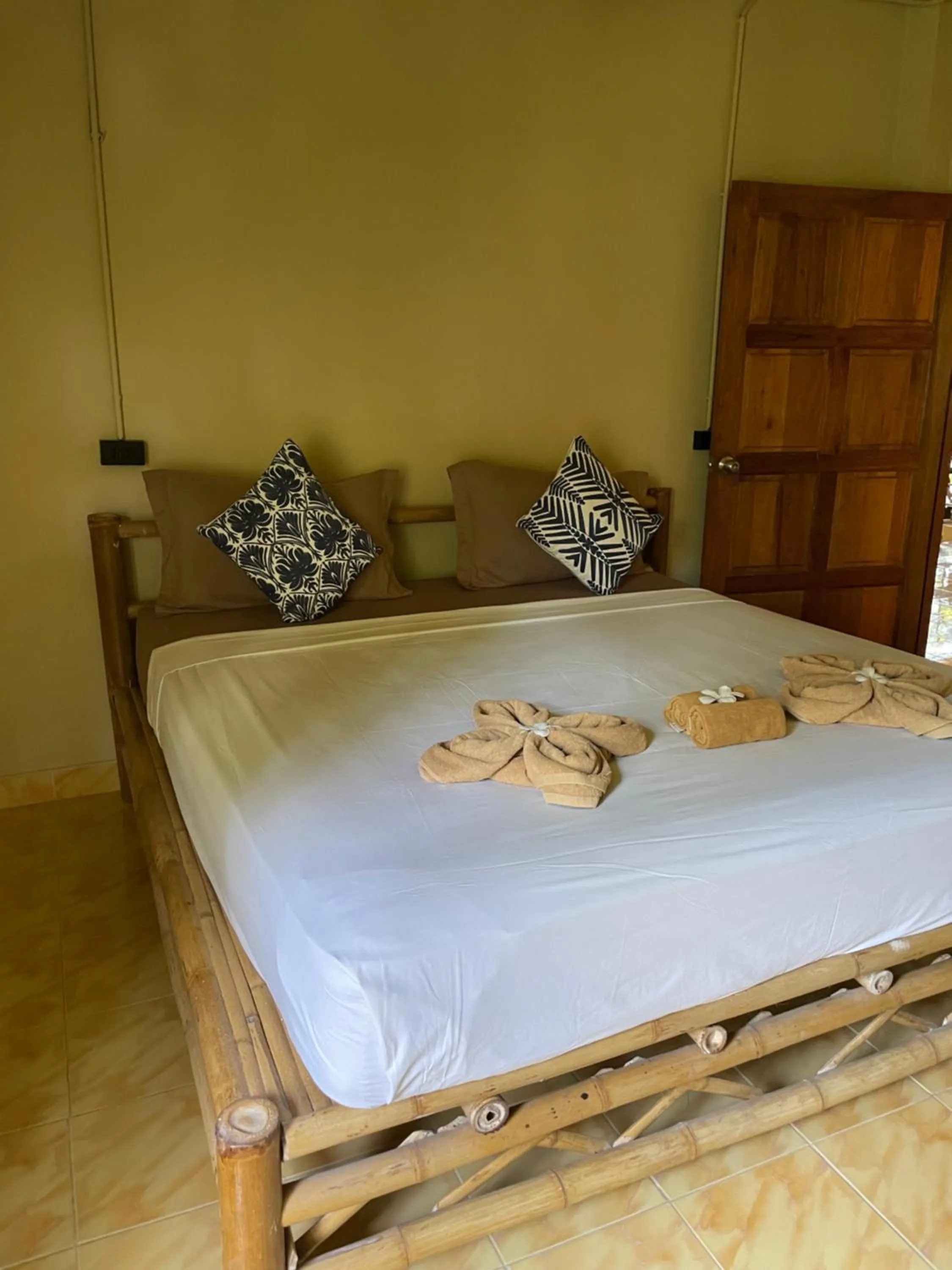 Bed in Mythai Guesthouse
