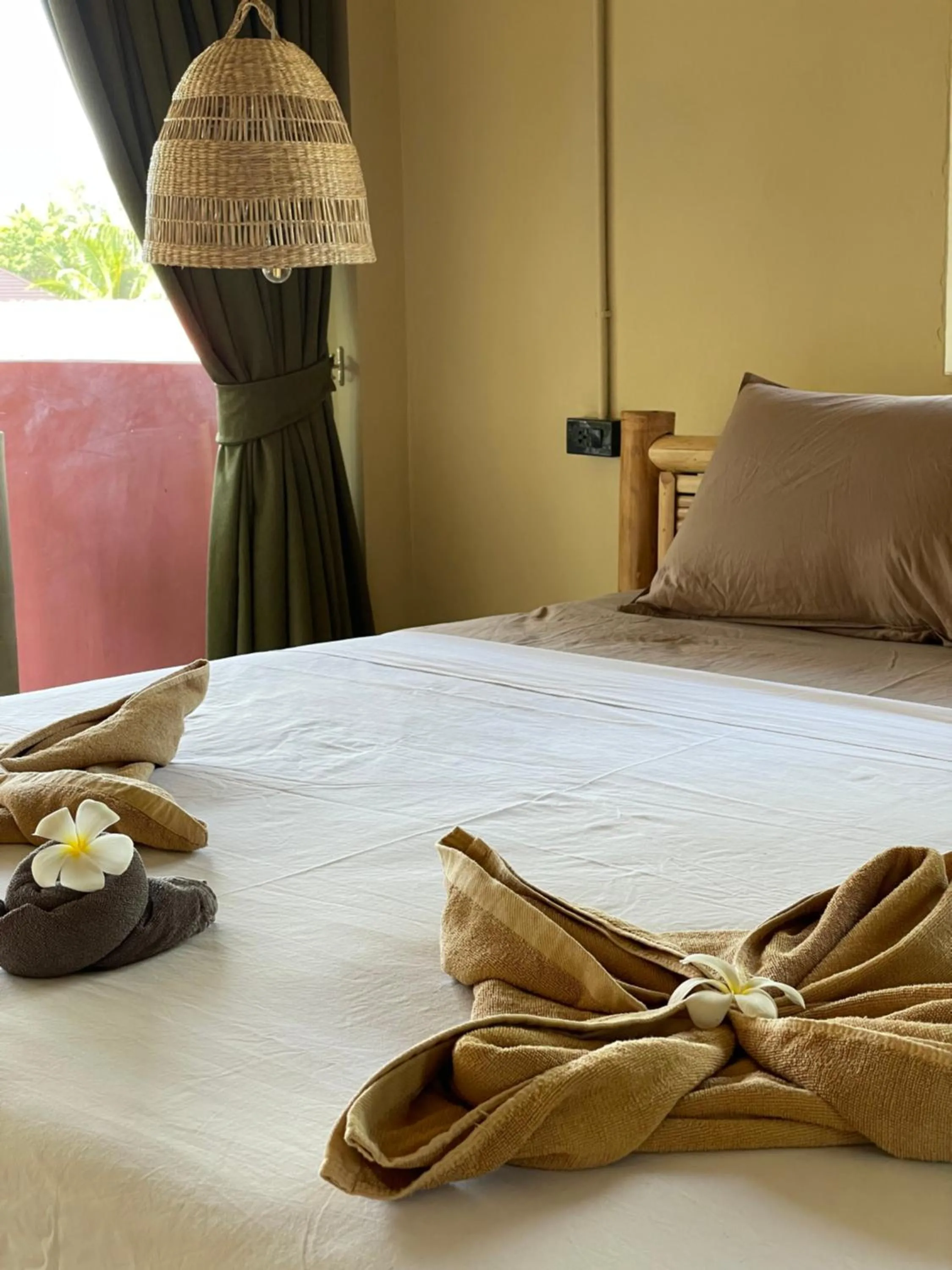 towels, Bed in Mythai Guesthouse