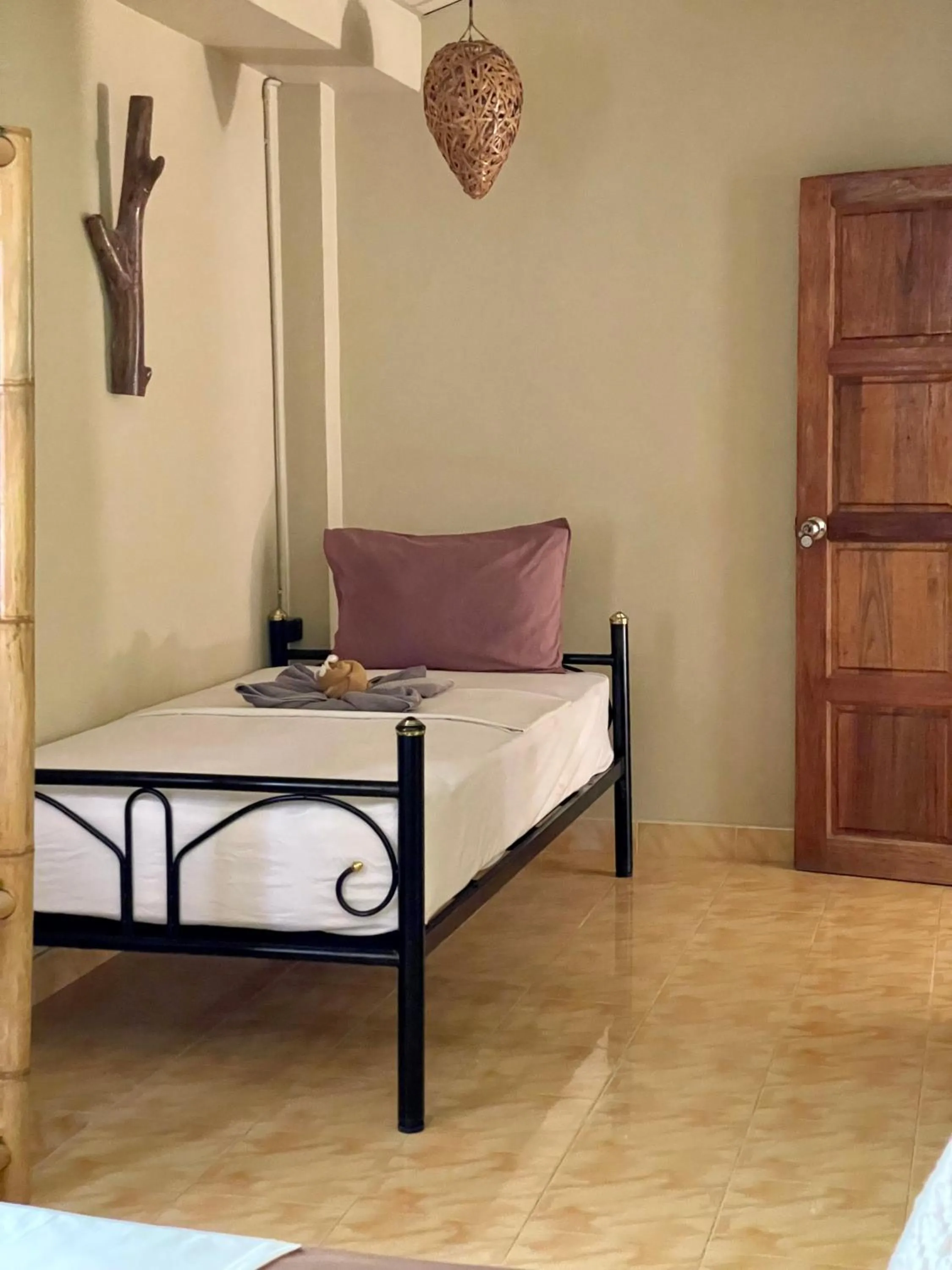 Bed in Mythai Guesthouse