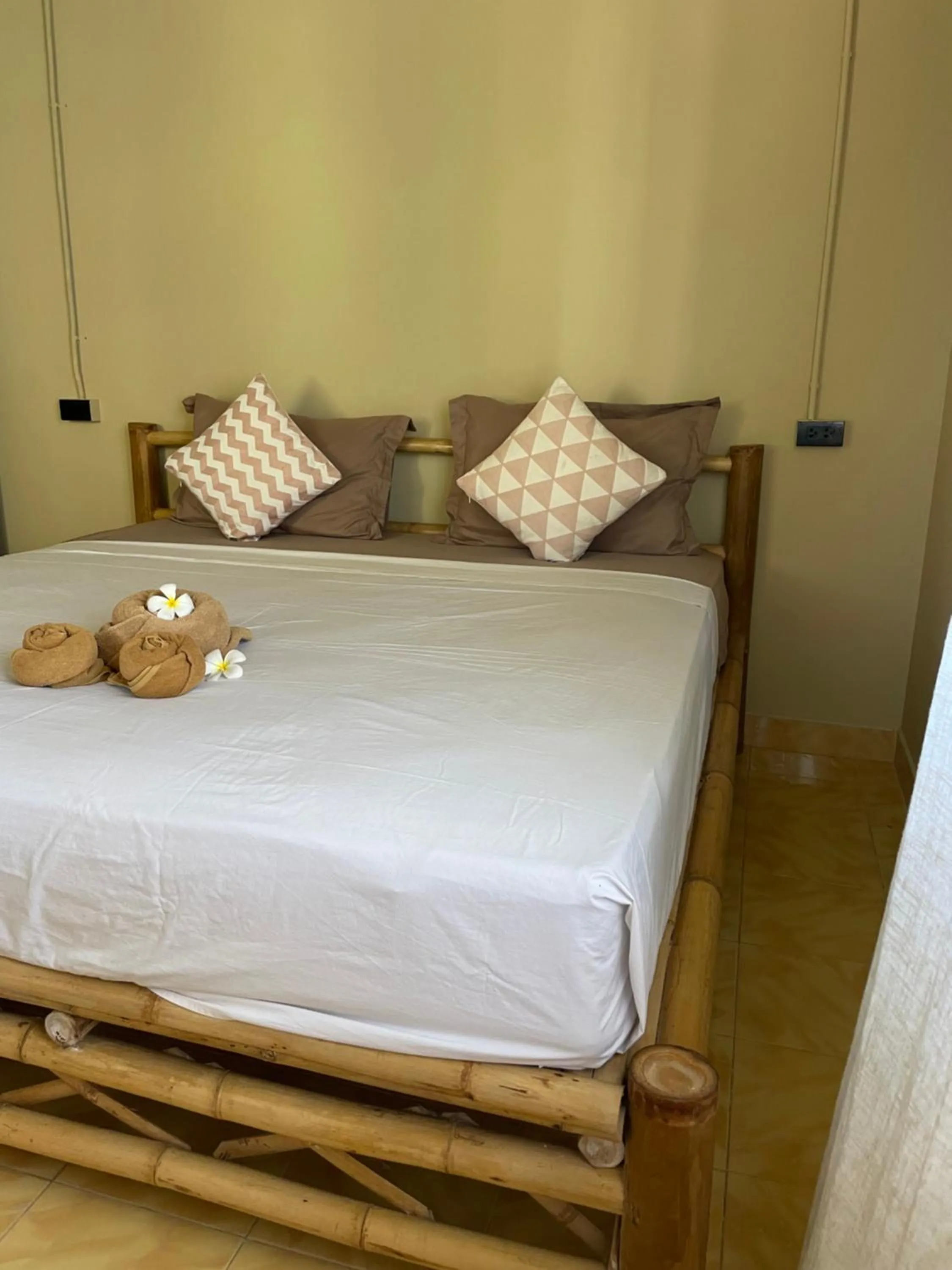 Bed in Mythai Guesthouse