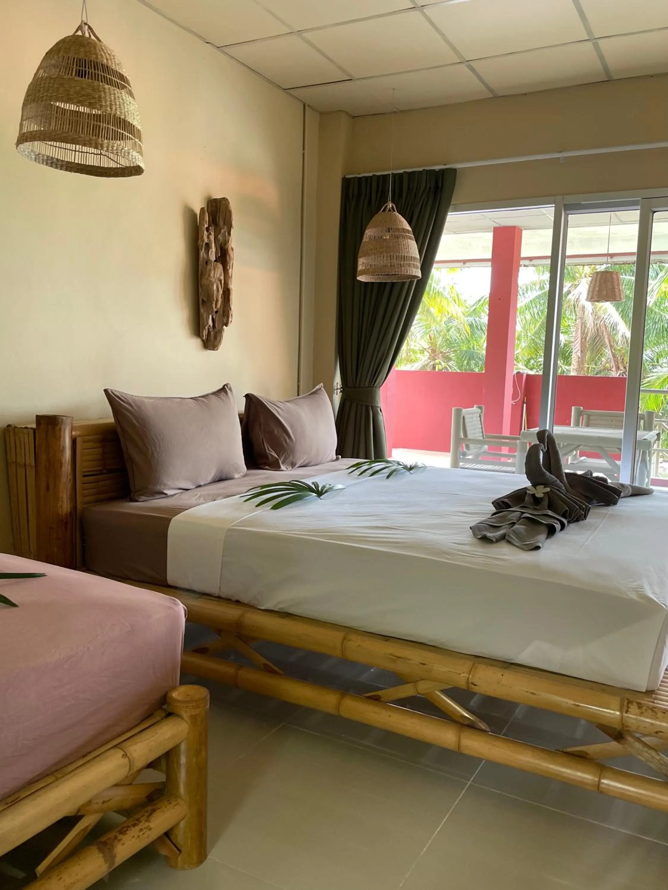 Bed in Mythai Guesthouse