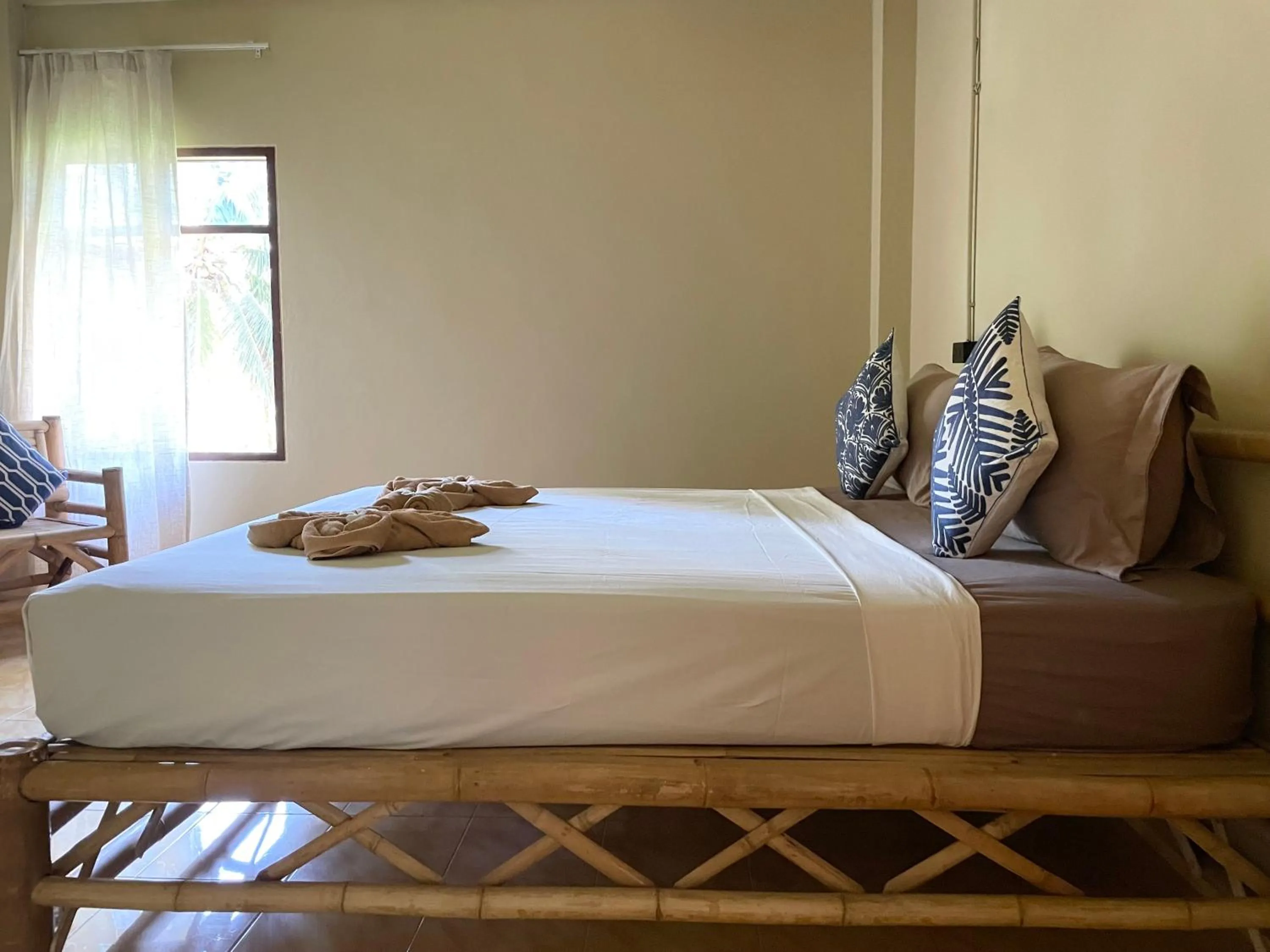 Bed in Mythai Guesthouse