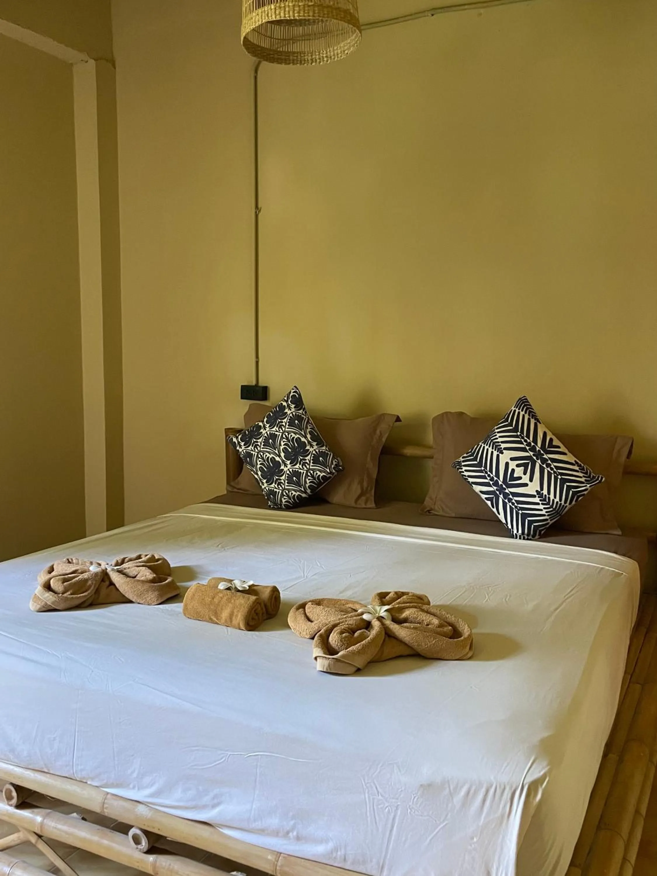 Bed in Mythai Guesthouse
