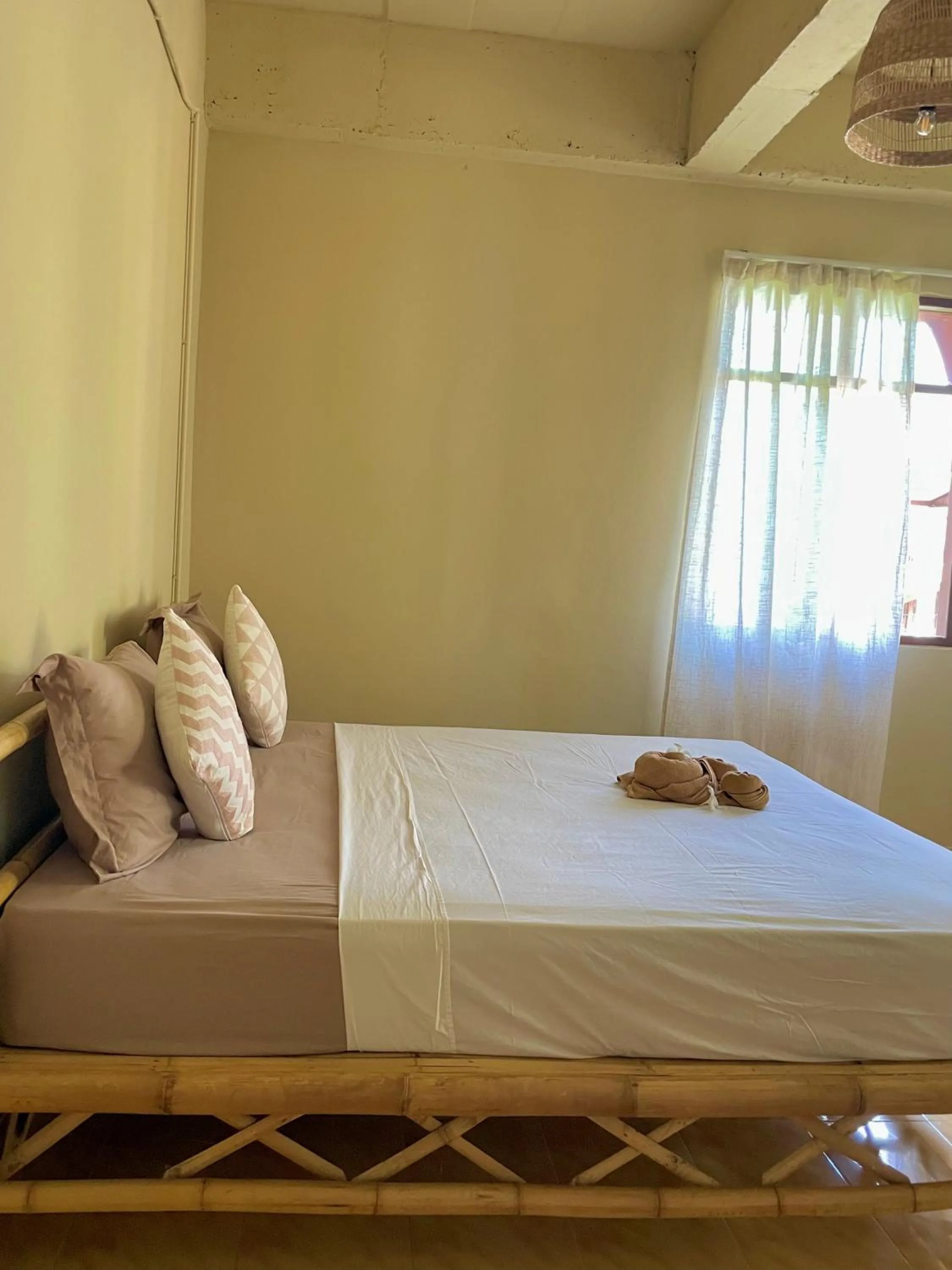 Bed in Mythai Guesthouse