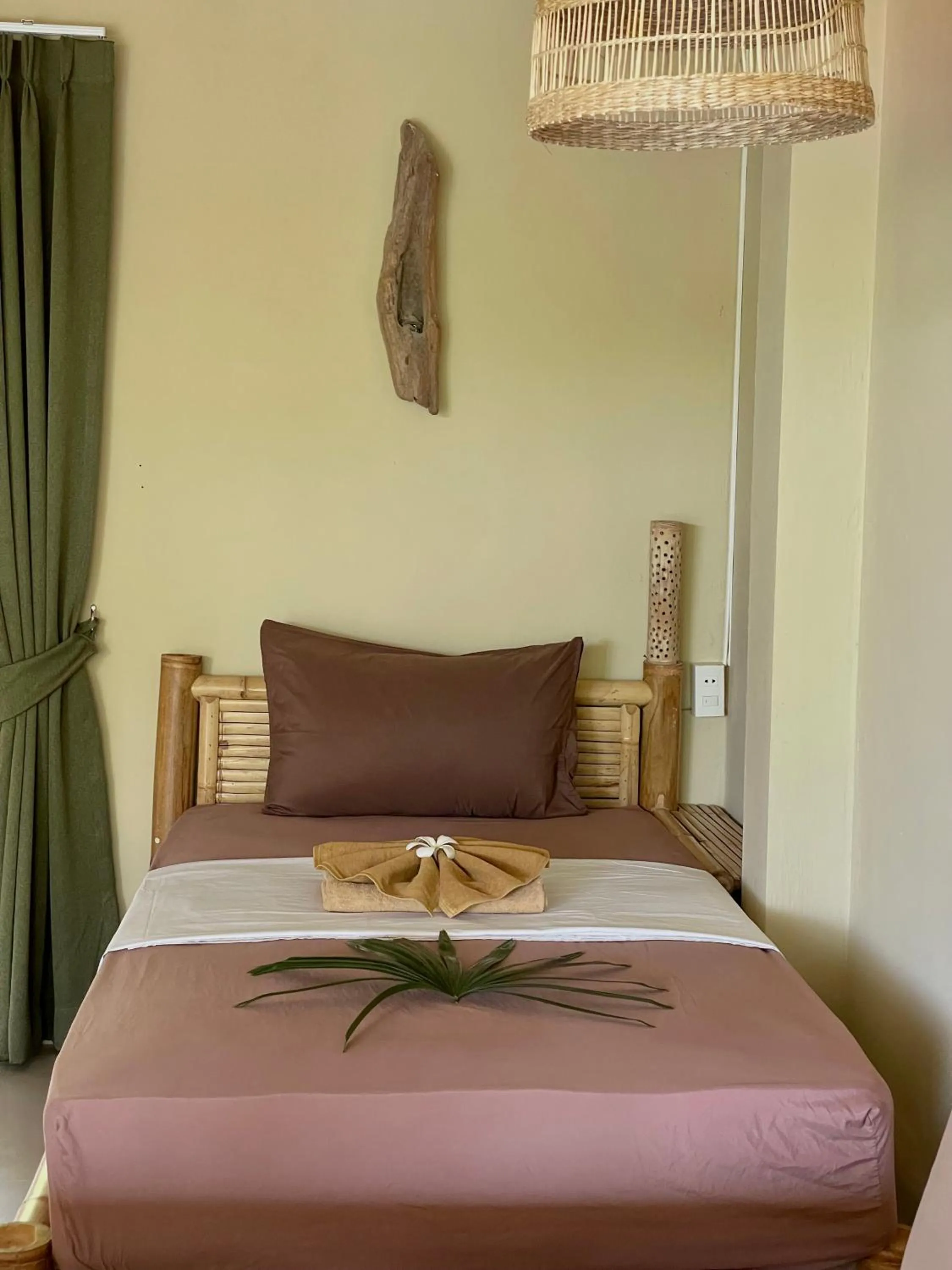 Bed in Mythai Guesthouse