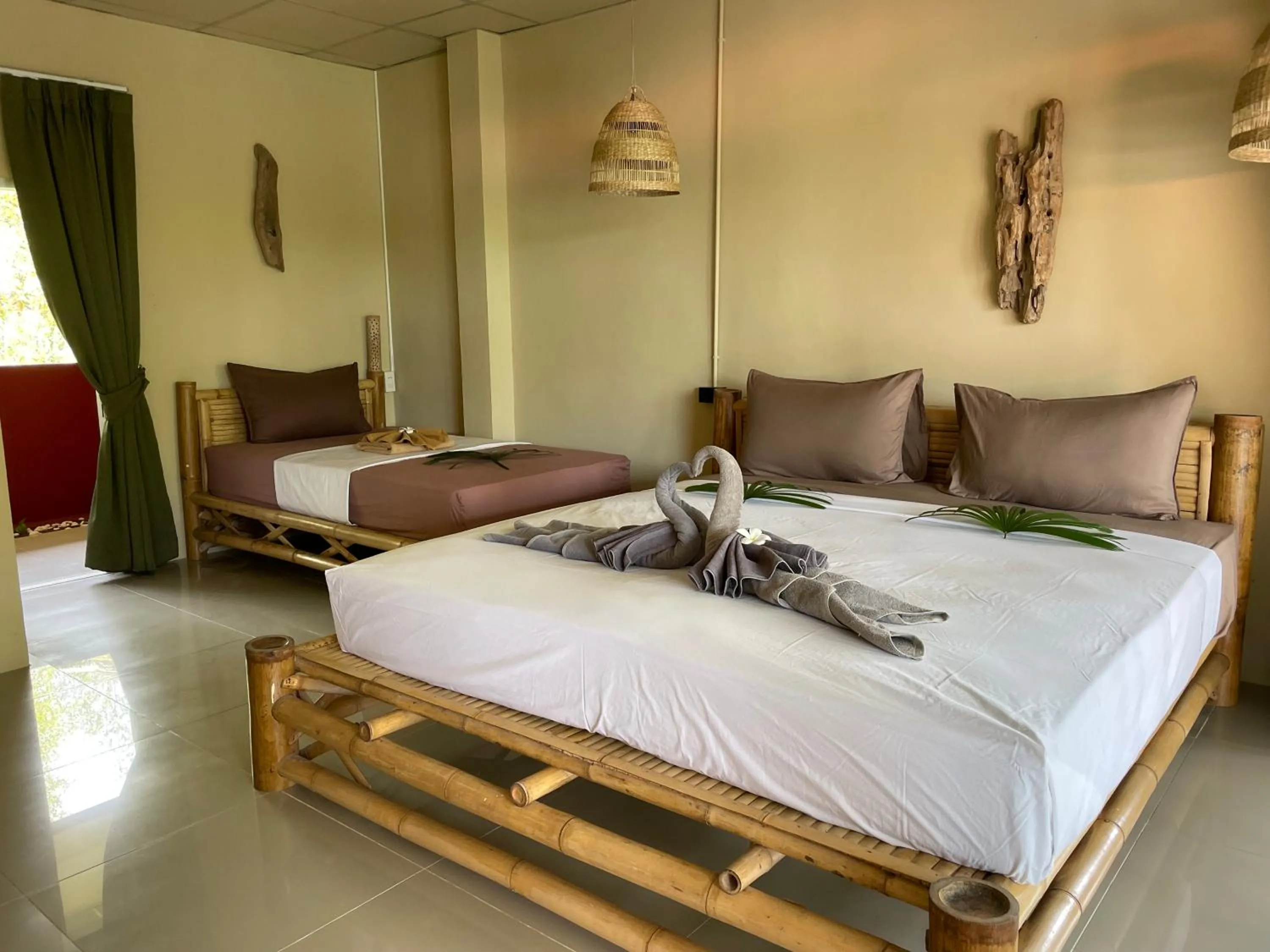 Bed in Mythai Guesthouse