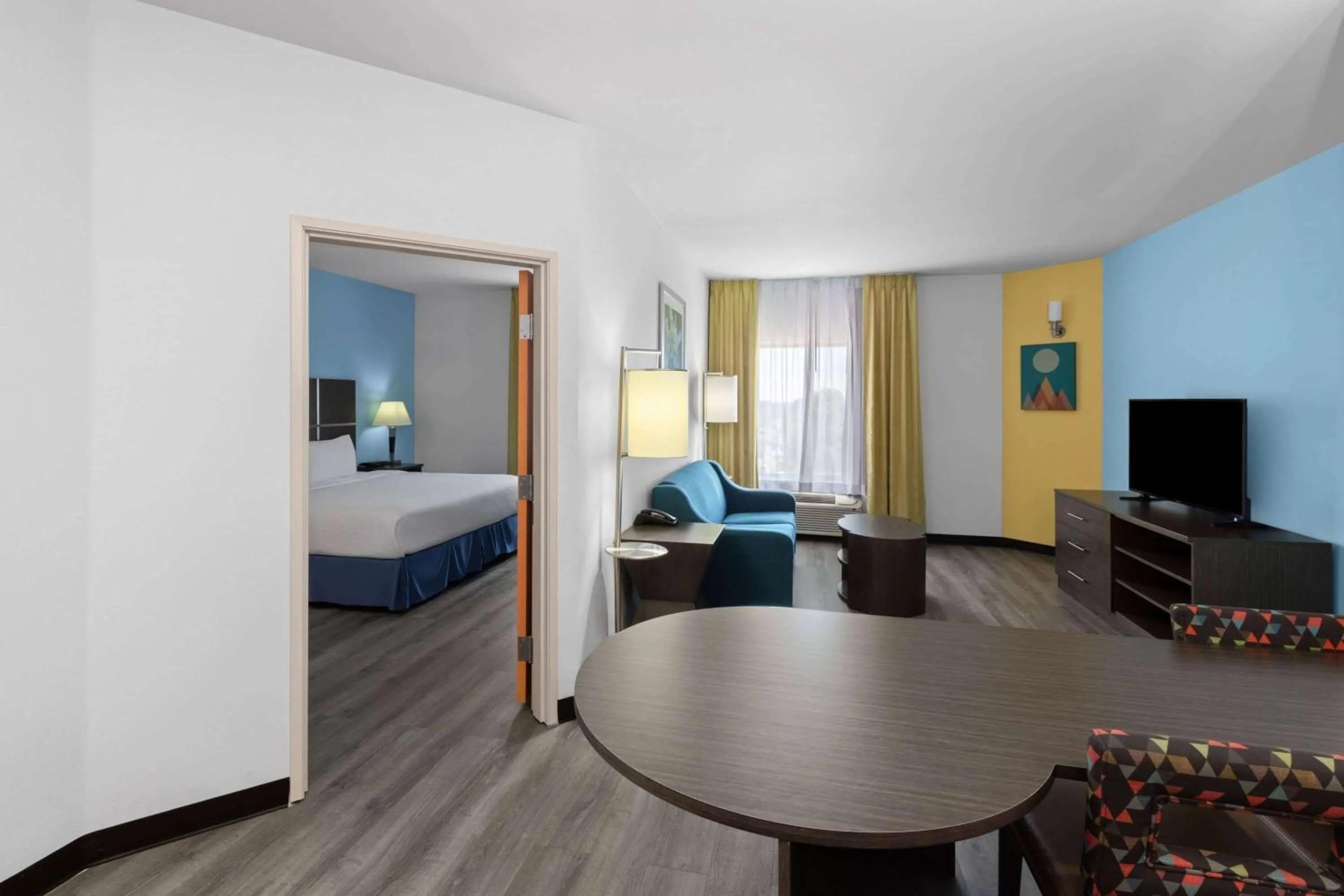 Photo of the whole room, Bed in Days Inn & Suites by Wyndham Lubbock Medical Center