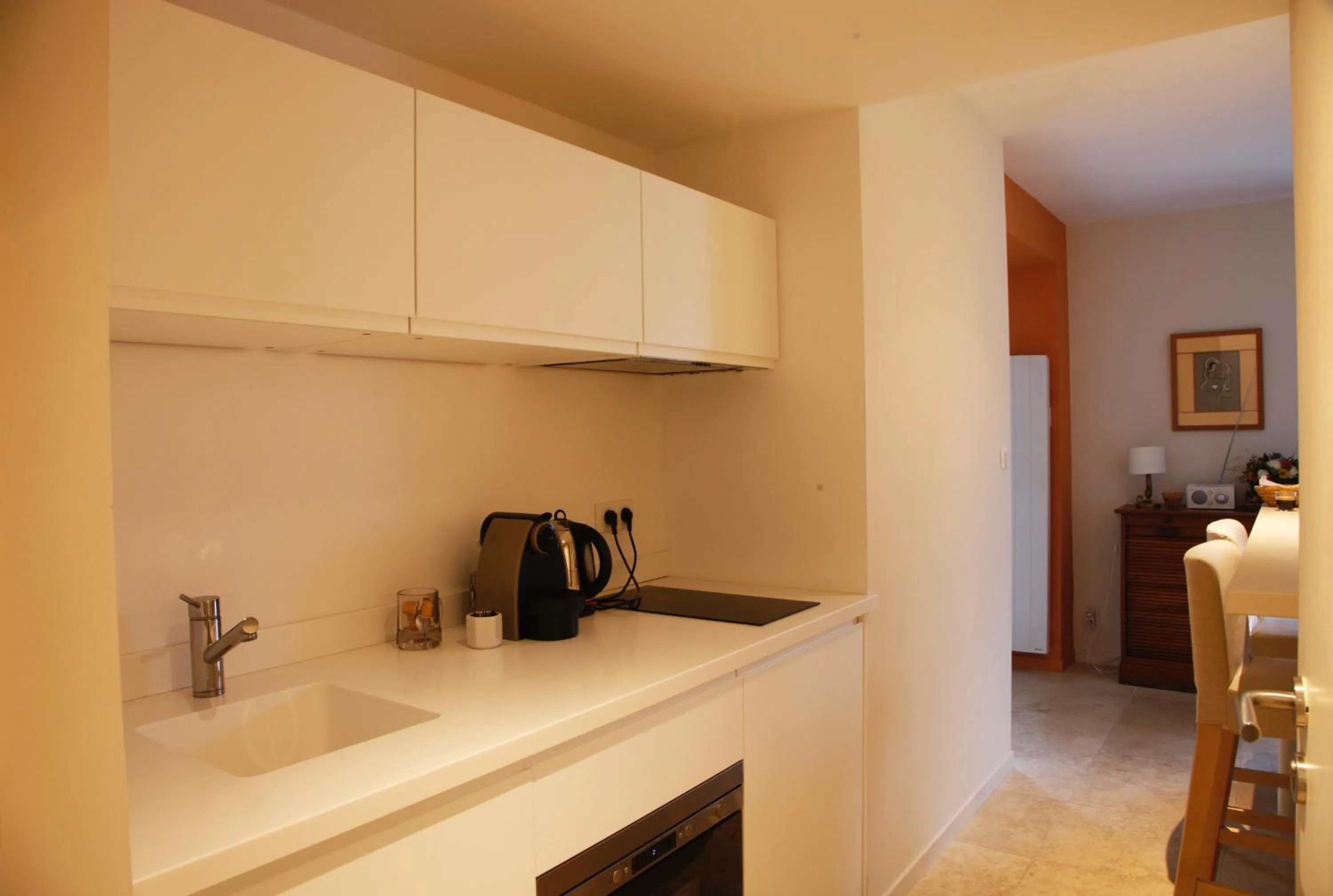 Kitchen or kitchenette in Les Suites de Catherine, la 35