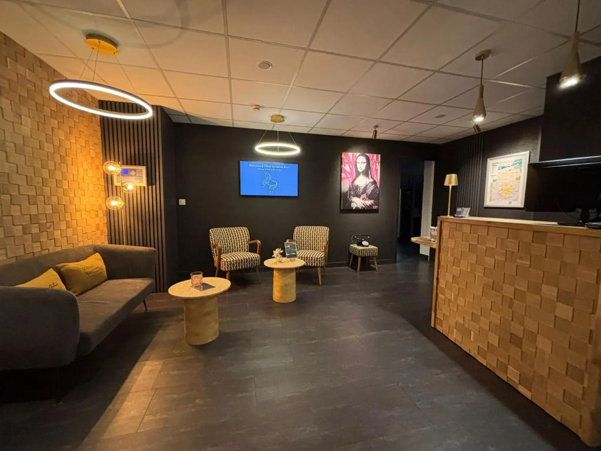 Lobby or reception in Cit'Hotel Le Cheval Blanc, Cognac Centre Lobby or reception in Cit'Hotel Le Cheval Blanc, Cognac Centre