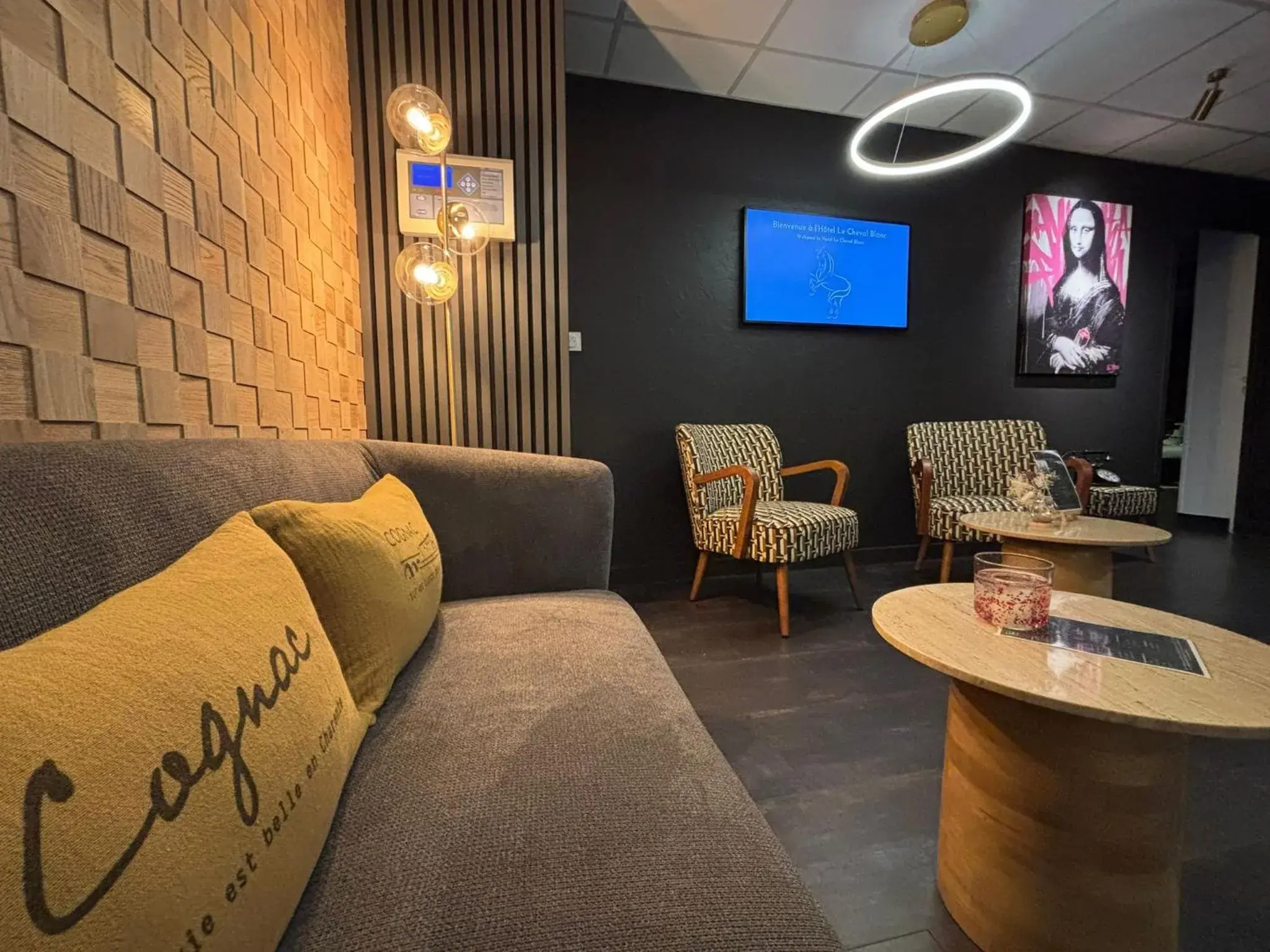 Lobby or reception in Cit'Hotel Le Cheval Blanc, Cognac Centre Lobby or reception in Cit'Hotel Le Cheval Blanc, Cognac Centre