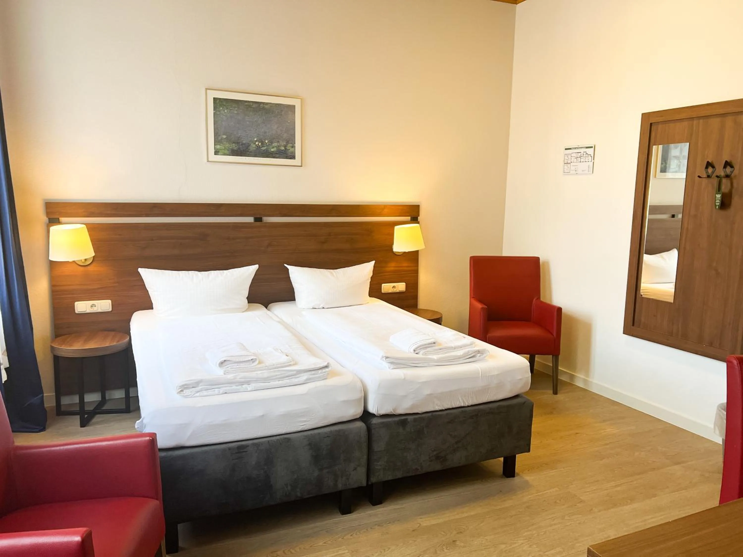 Bed in Hotel Fränkischer Hof