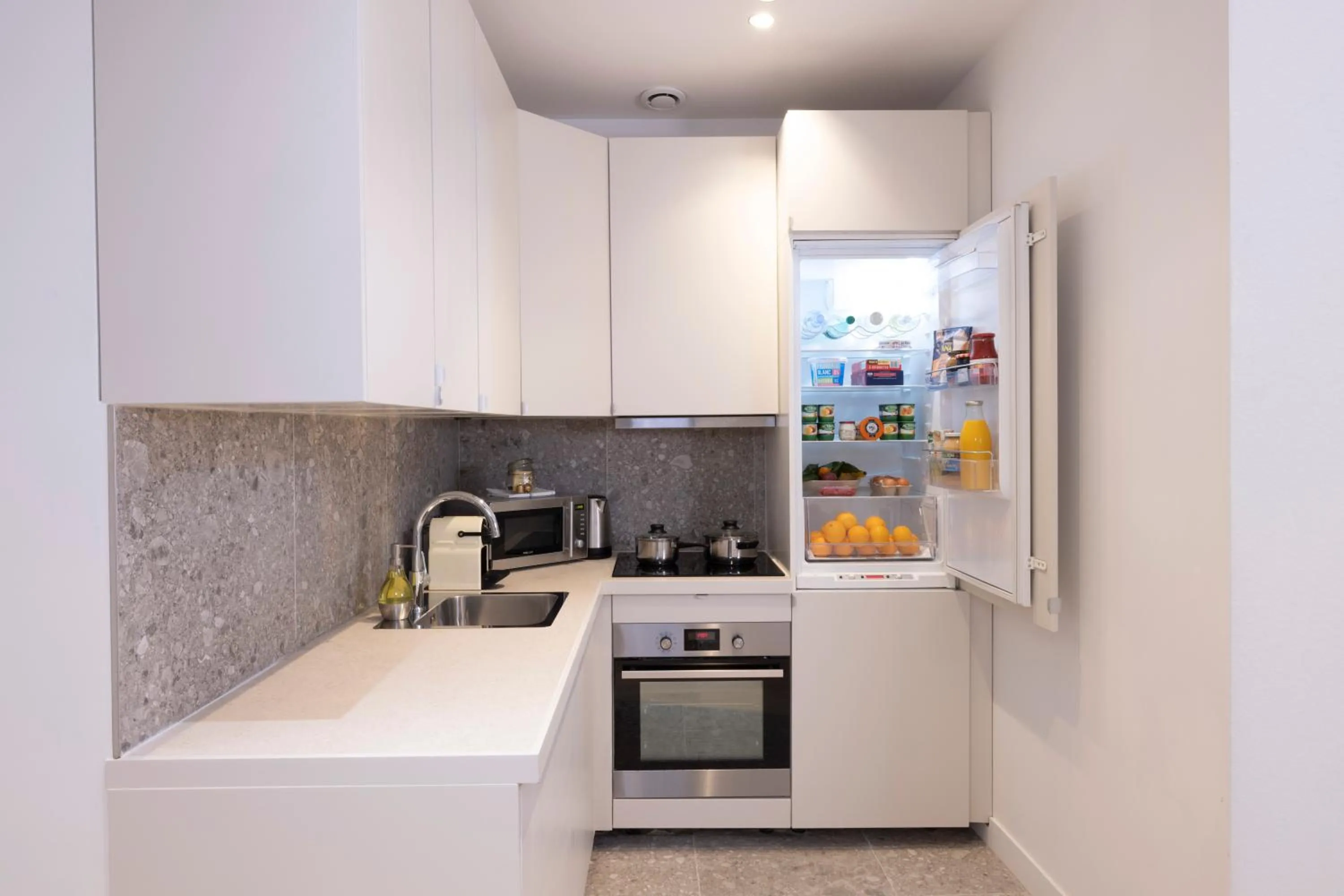 Kitchen or kitchenette in Yuna Blanche - Serviced Apartments