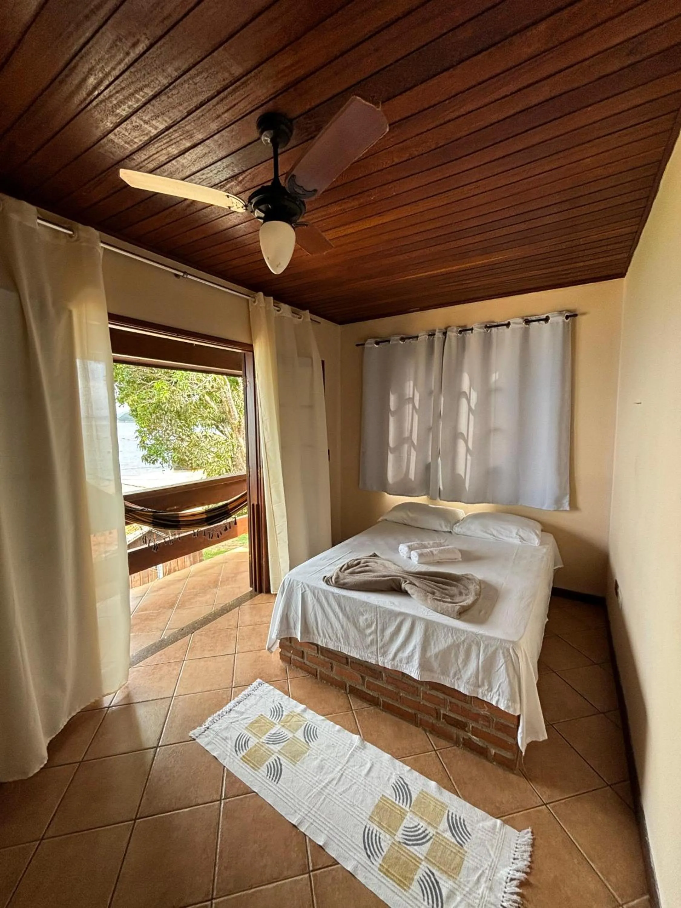 Bed in Pousada Tony Montana