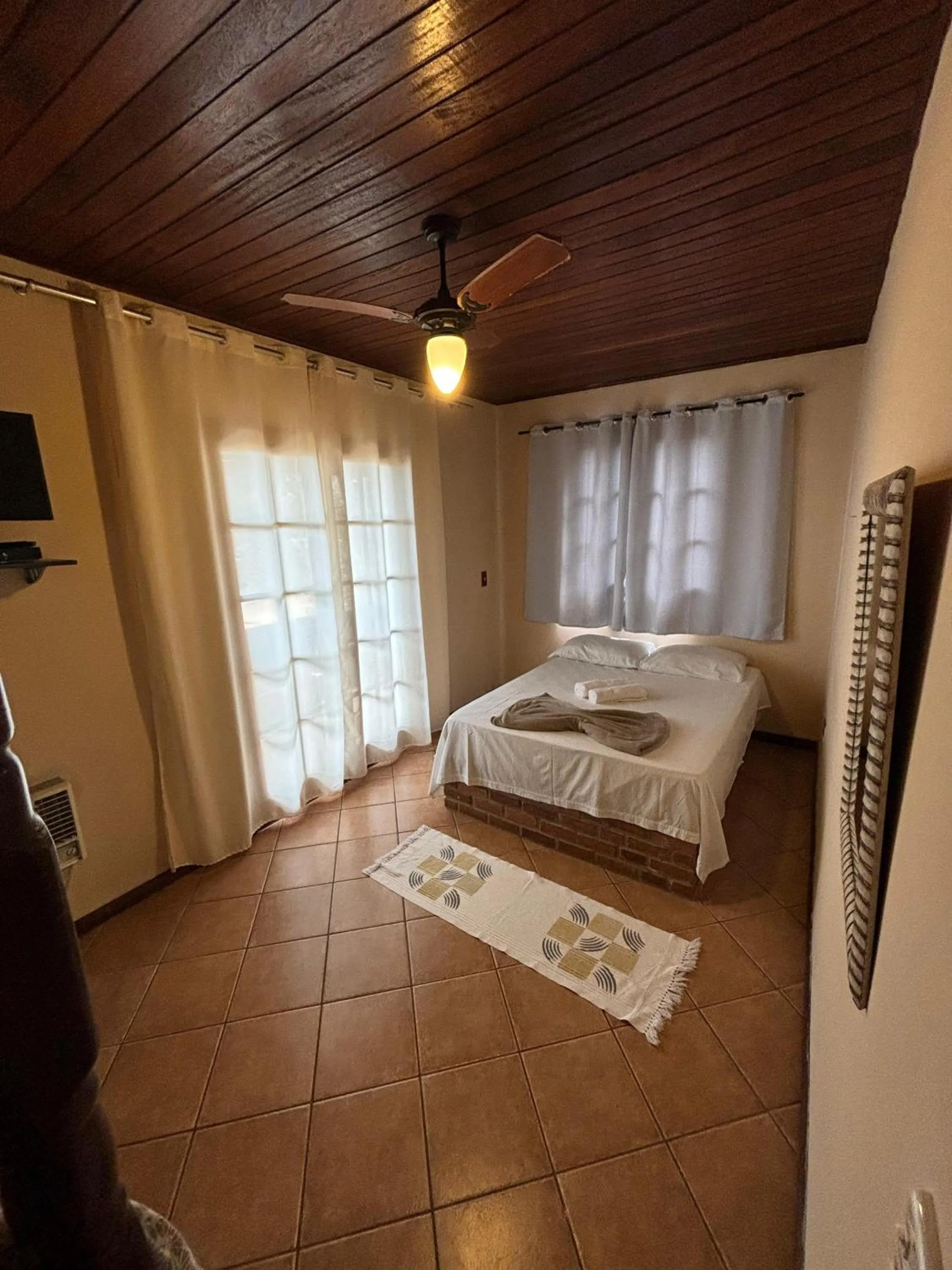 Bed in Pousada Tony Montana