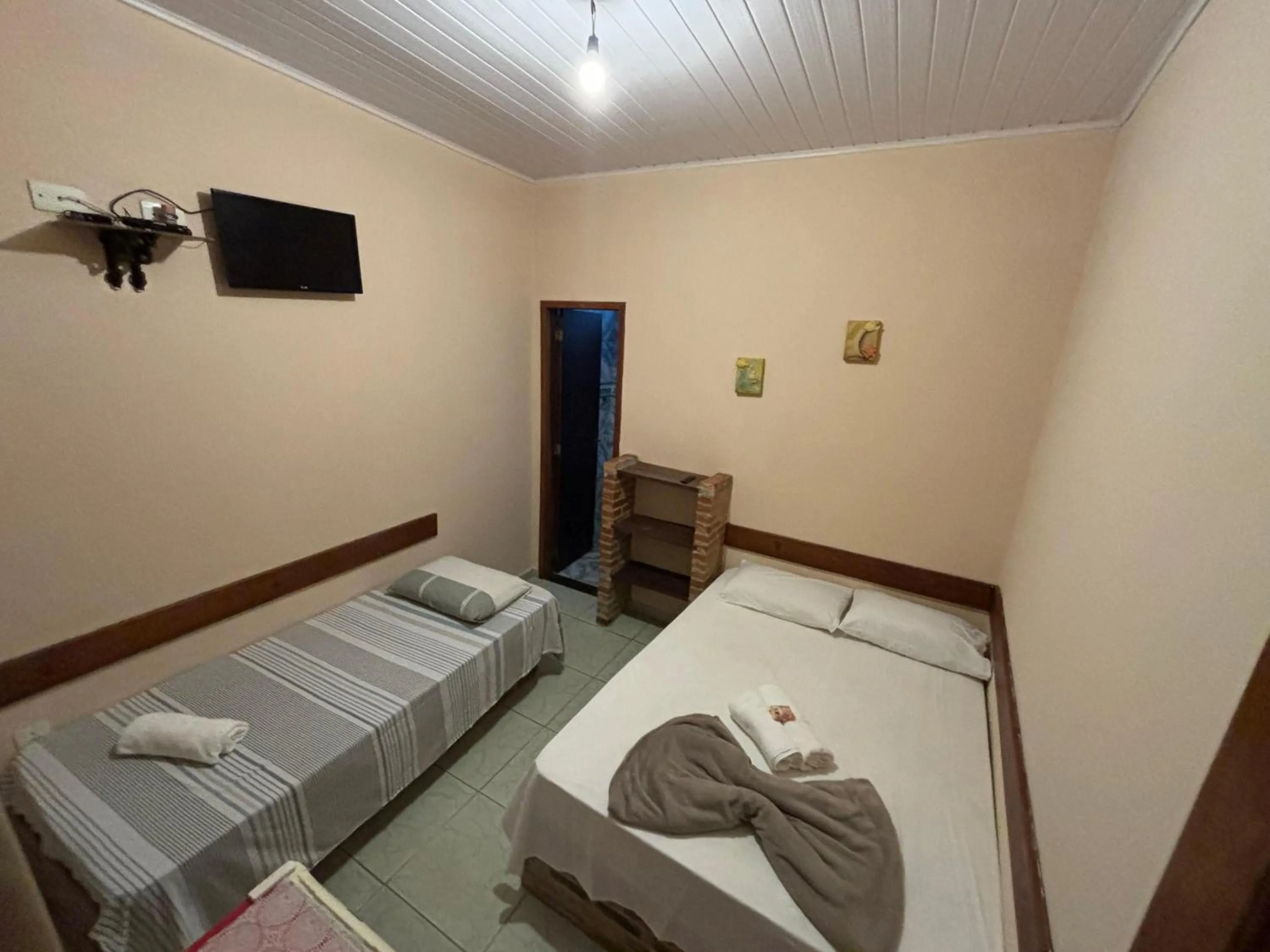 Bed in Pousada Tony Montana
