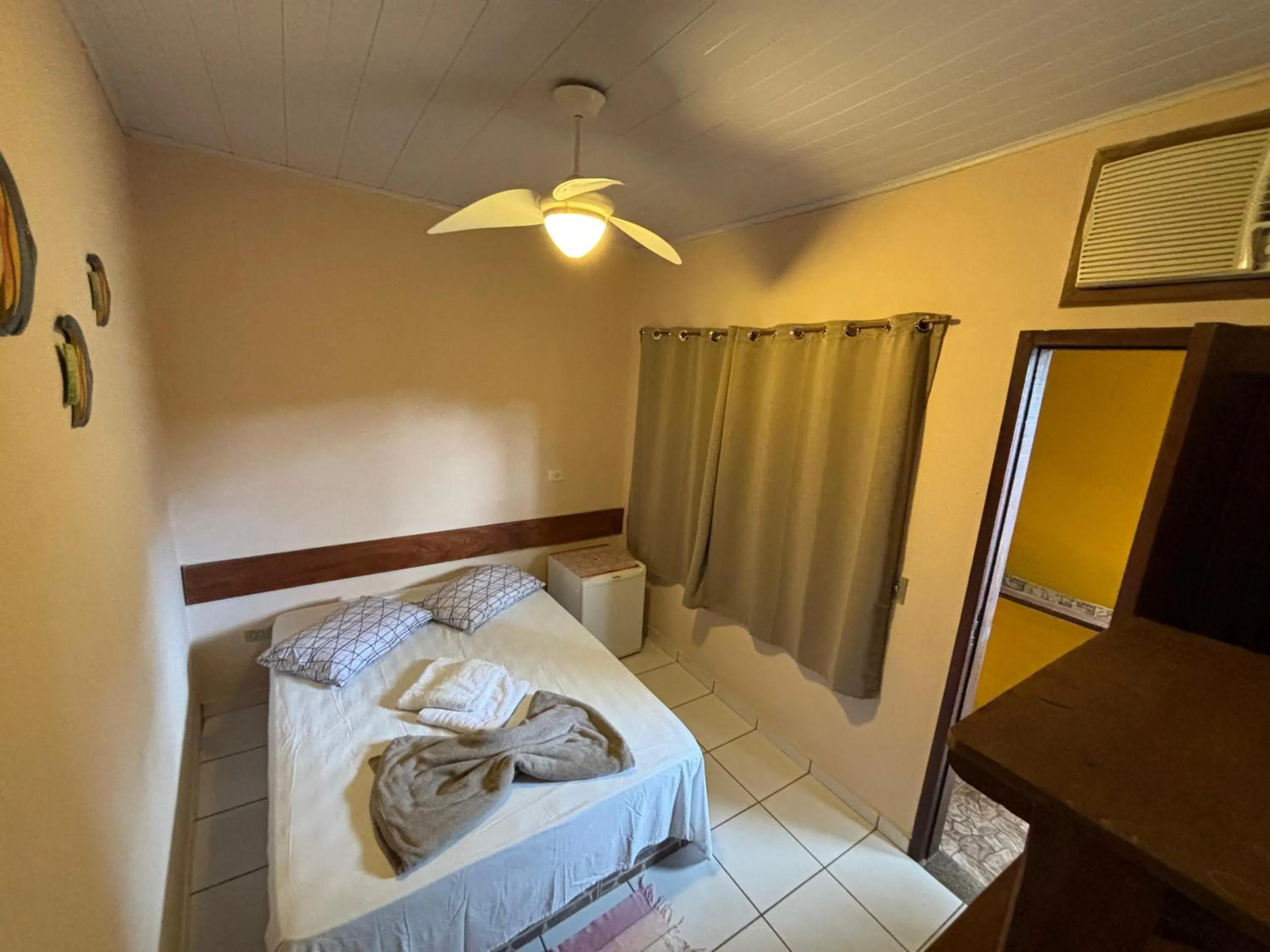Bed in Pousada Tony Montana