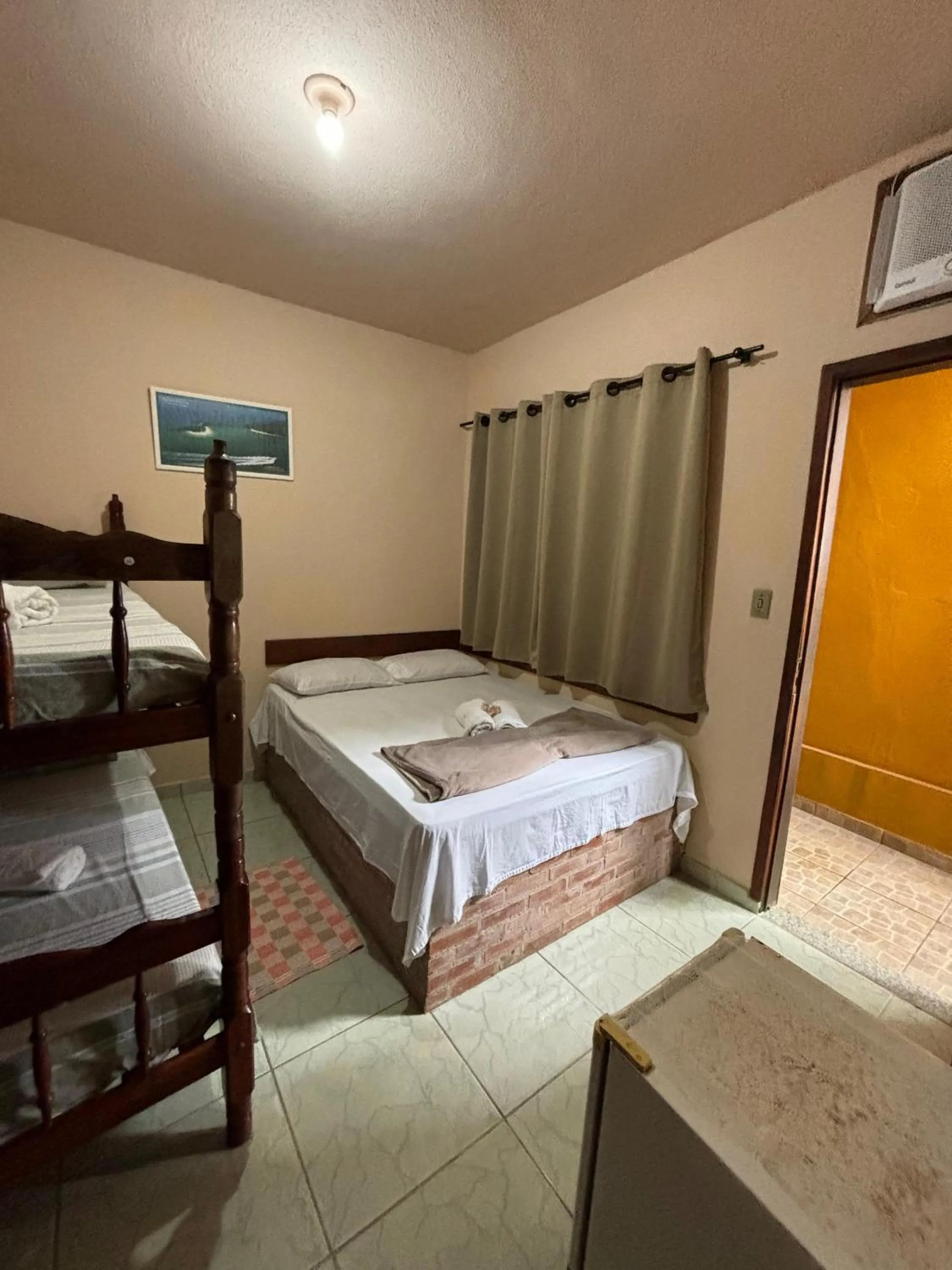 Bed in Pousada Tony Montana