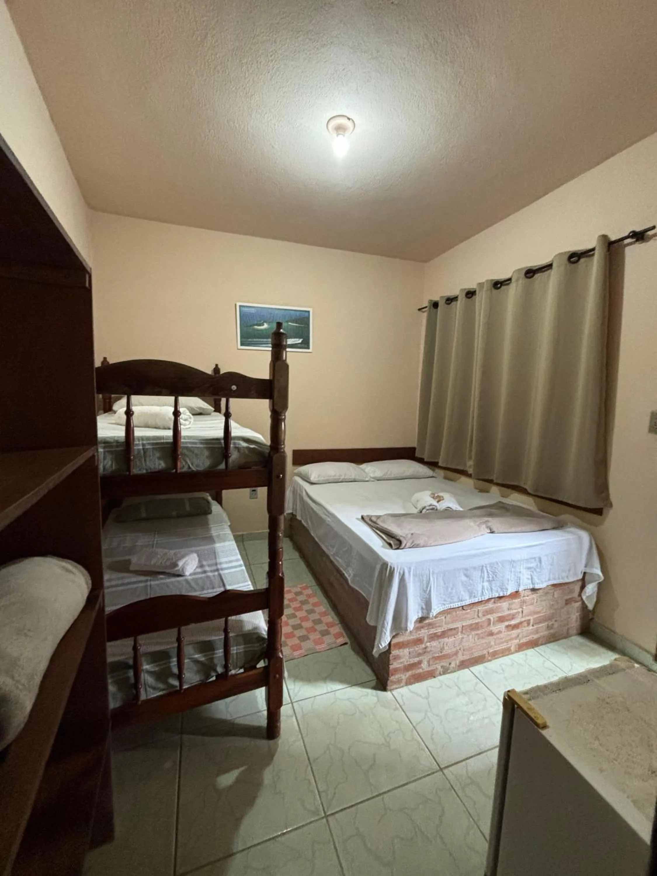 Bed in Pousada Tony Montana