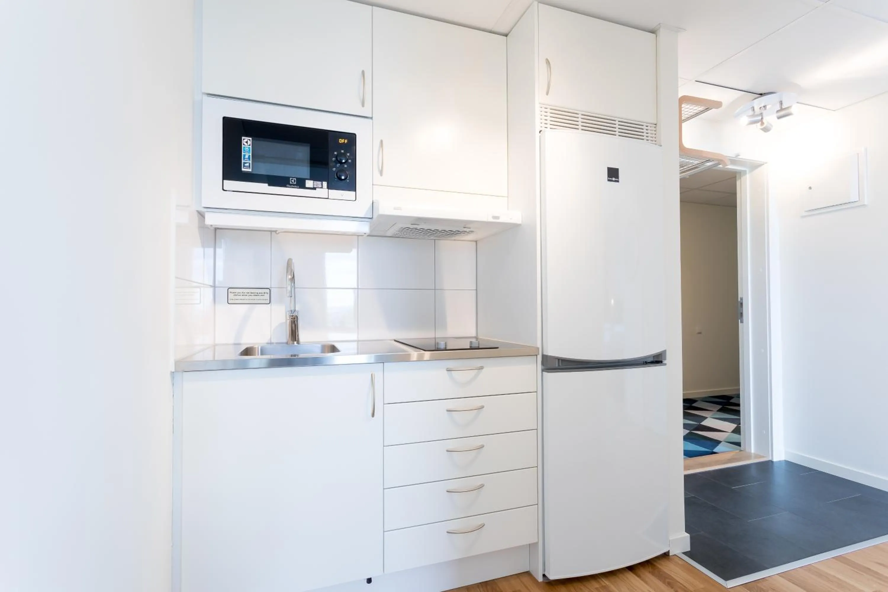 Kitchen or kitchenette in ApartDirect Älvsjö