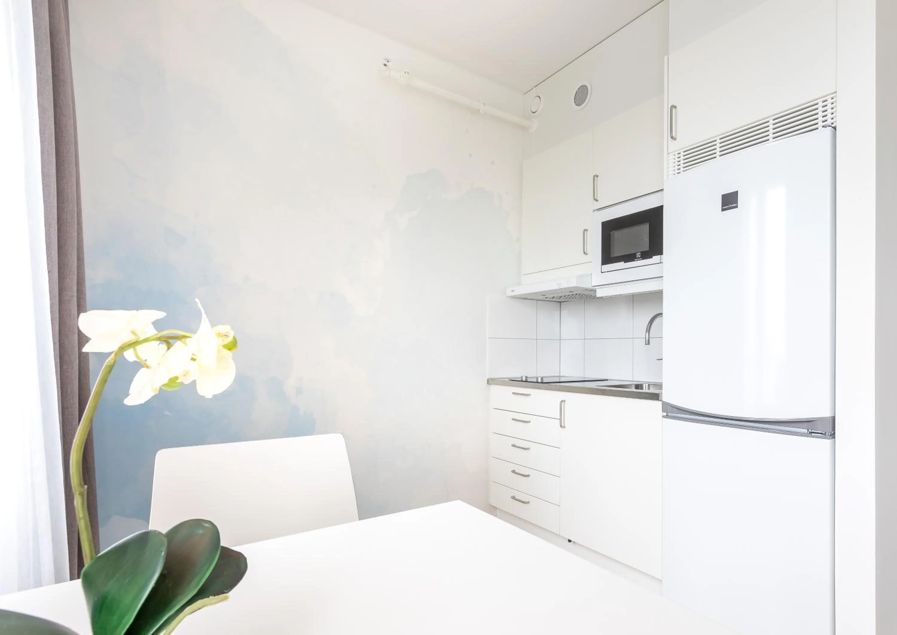 Kitchen or kitchenette in ApartDirect Älvsjö