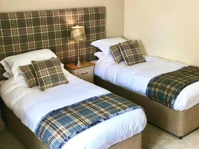 Bed in The Alma Inn Bed in The Alma Inn