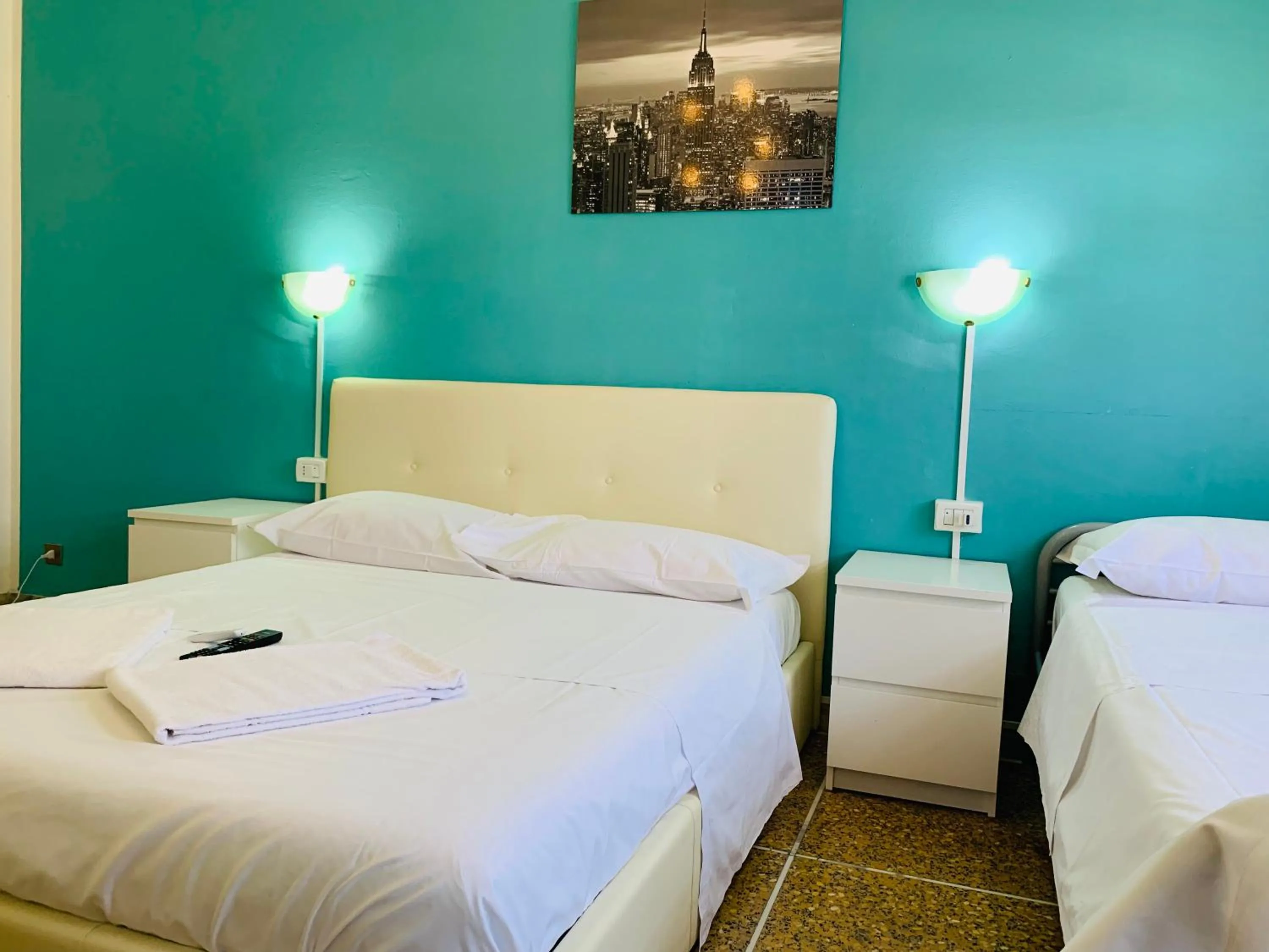 Bed in Pearl Pisa guest house