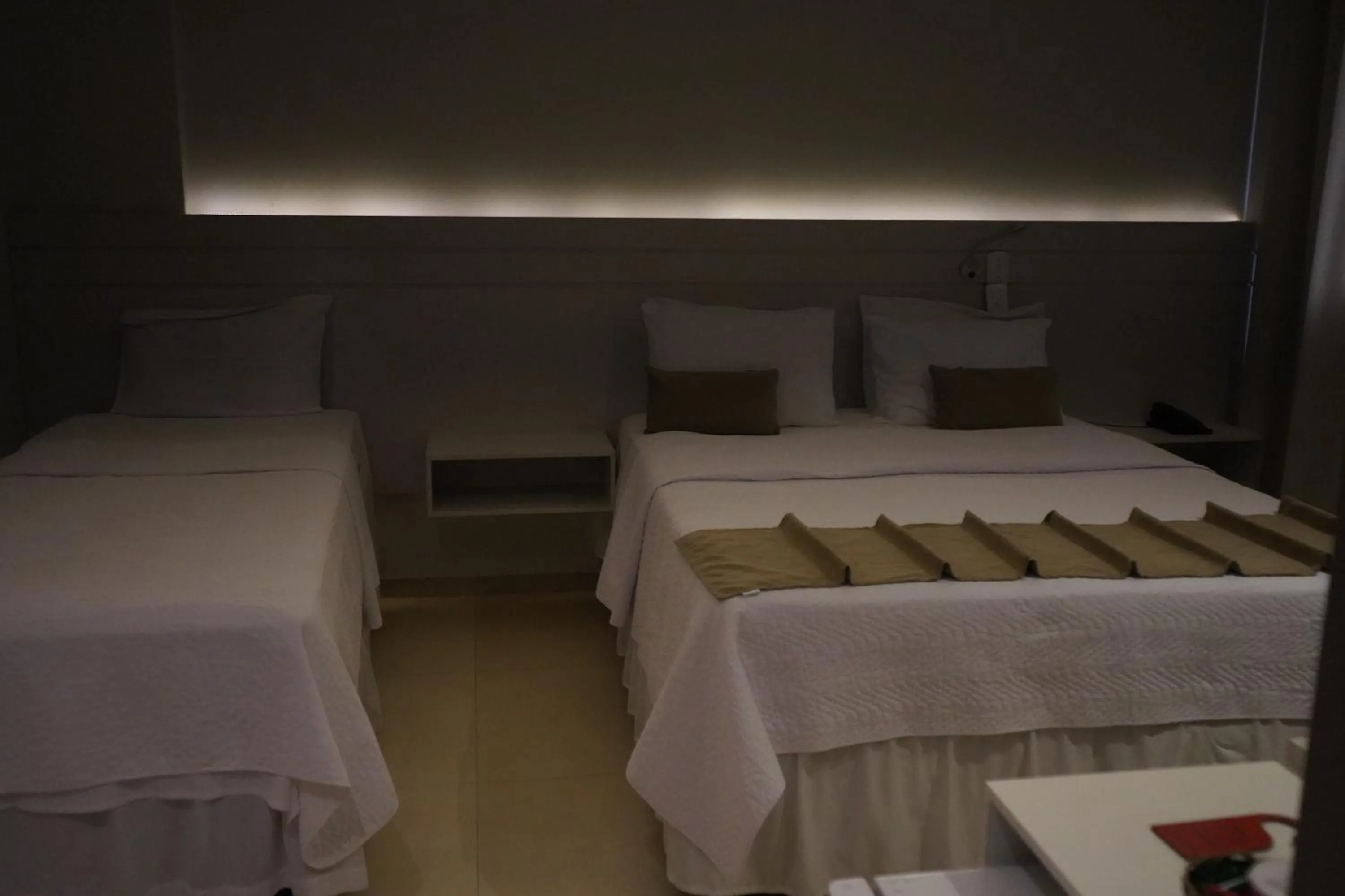 Bed in Pak Suítes Hotel