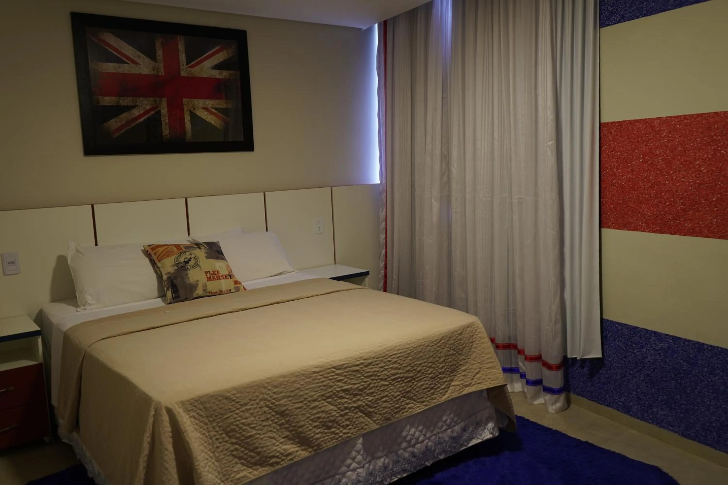 Bed in Pak Suítes Hotel