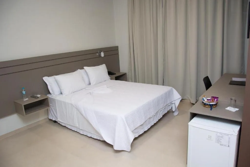 Bed in Pak Suítes Hotel