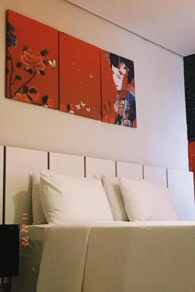 Bed in Pak Suítes Hotel