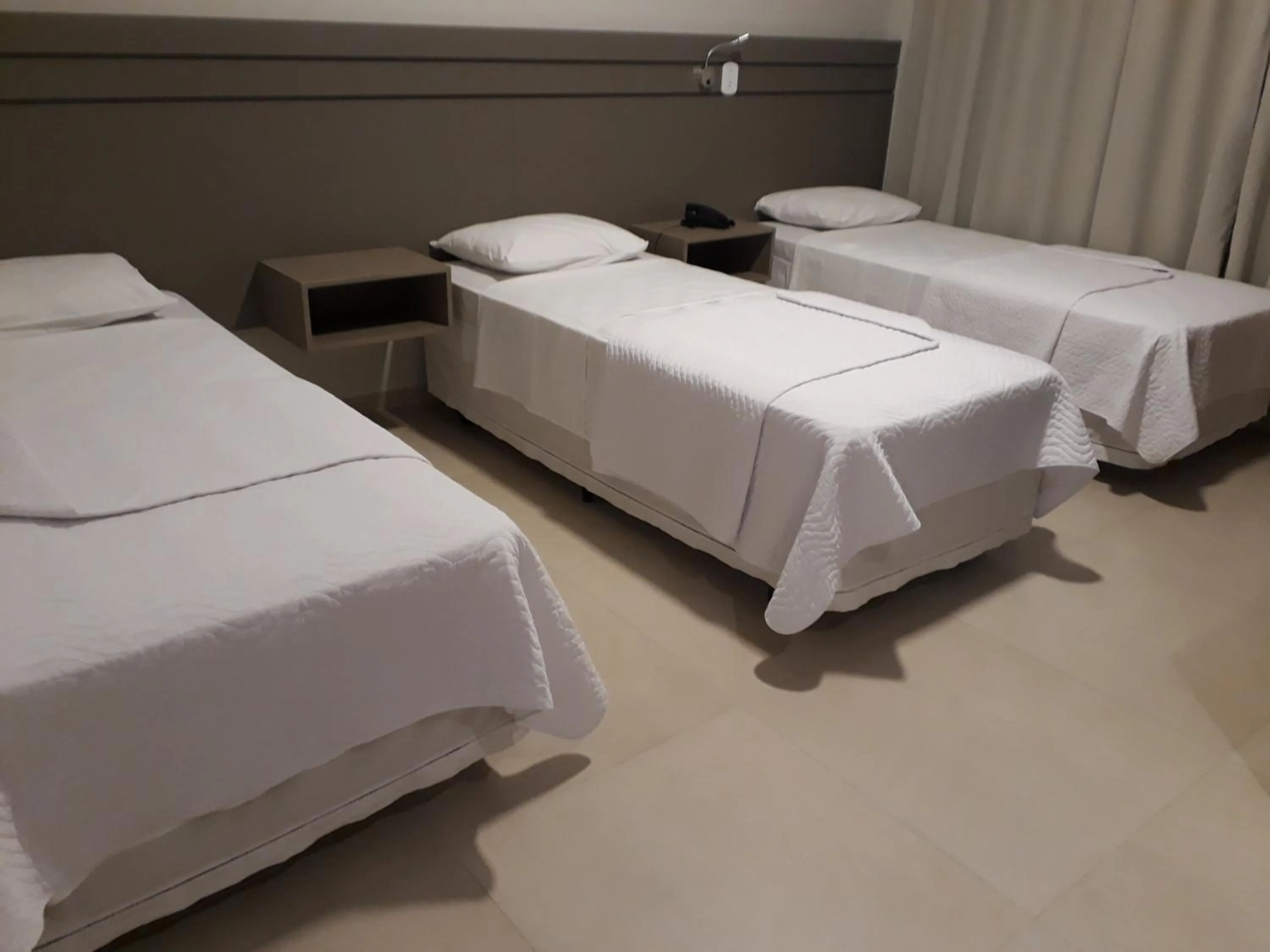 Bedroom, Bed in Pak Suítes Hotel