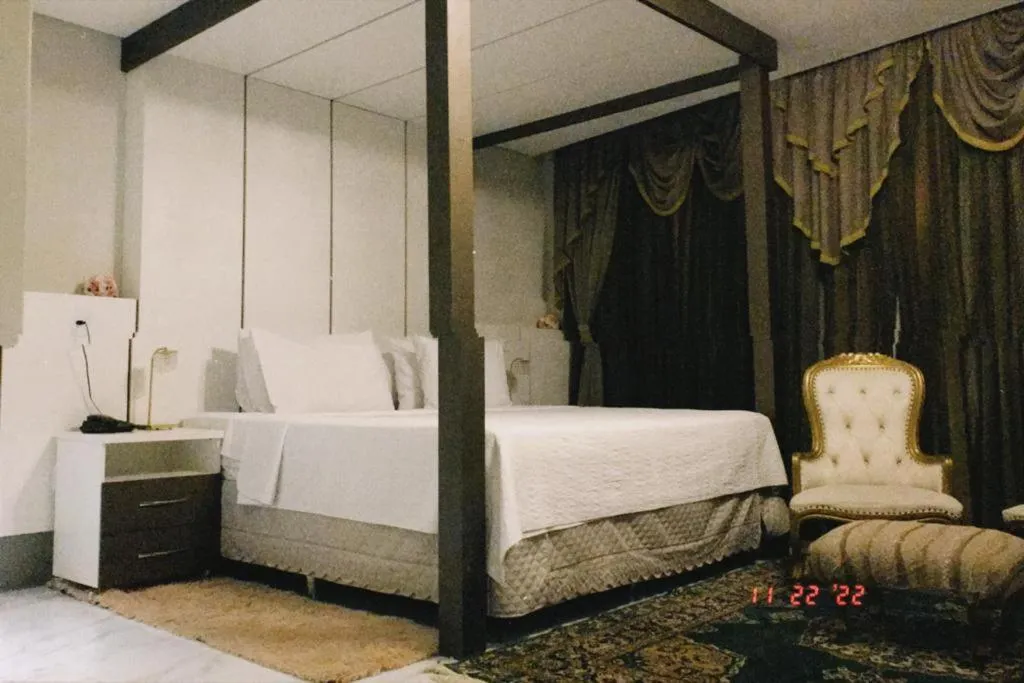 Bed in Pak Suítes Hotel